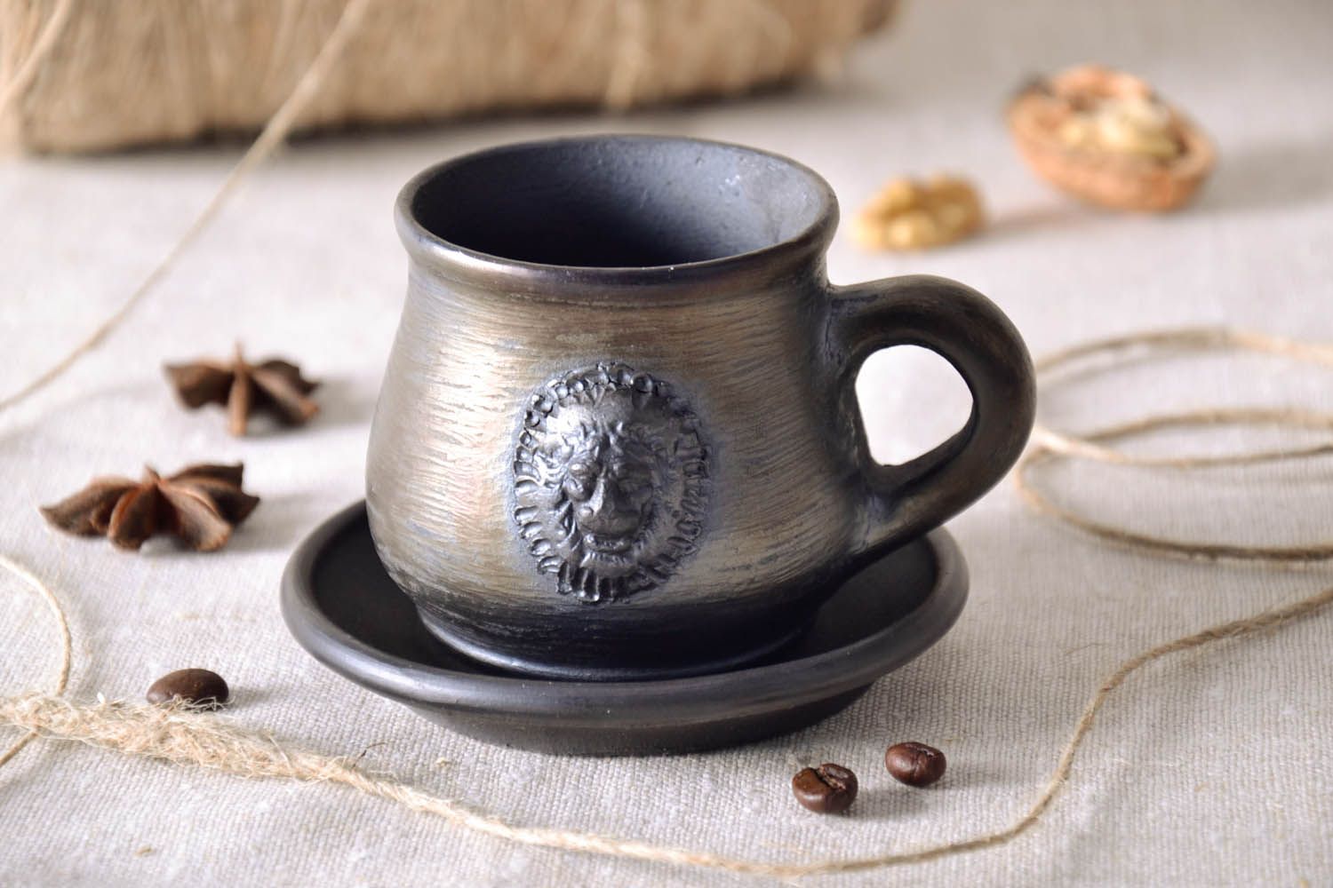 Чашка с блюдцем из чернодымленной керамики фото 1