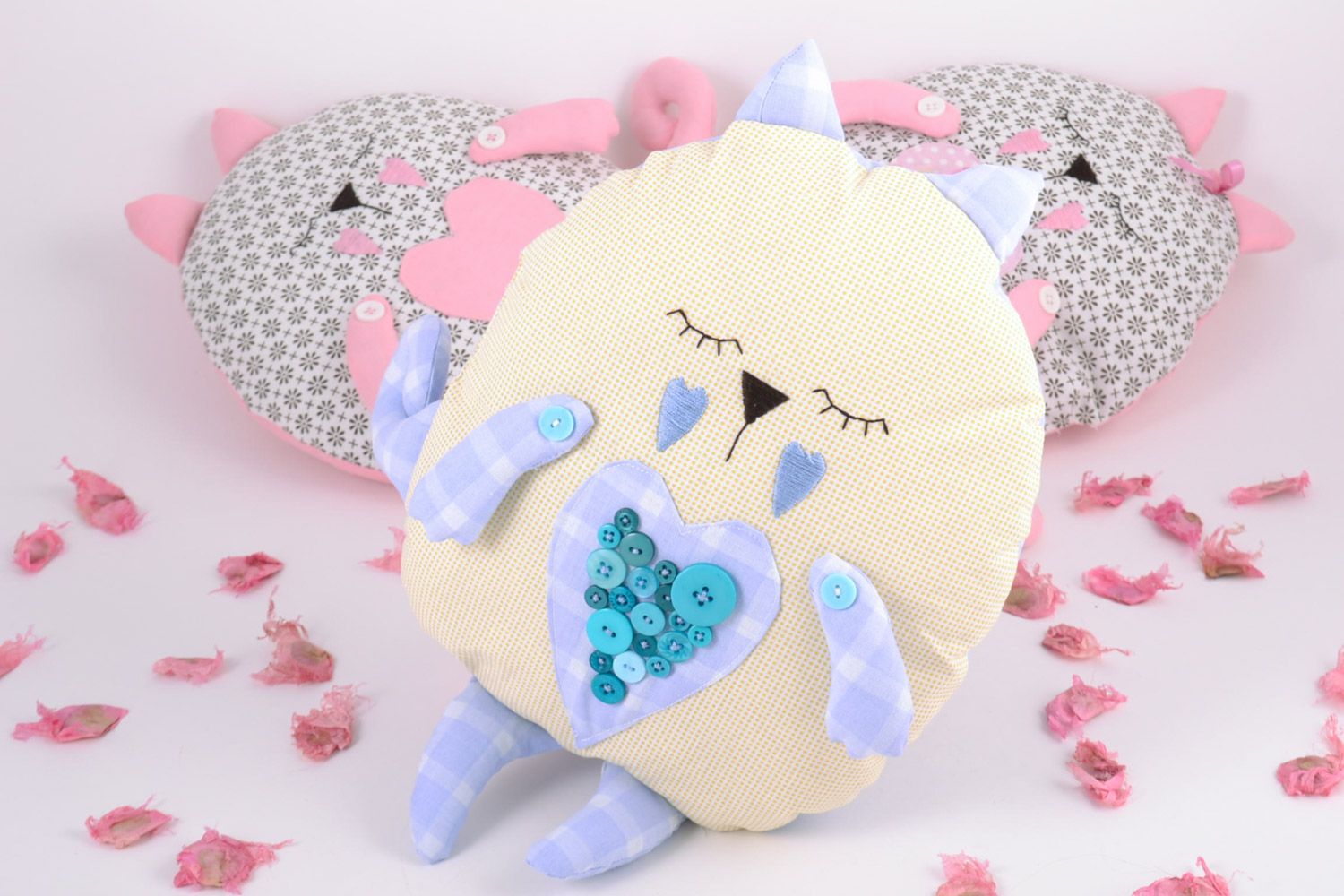Handmade decorative soft pillow pet sewn of pink and blue fabric sleepy cat photo 1
