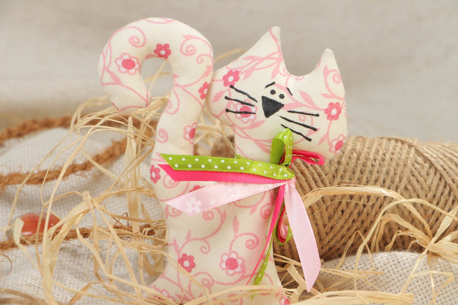 Handmade soft toy fridge magnet sewn of light patterned cotton fabric Cat photo 1