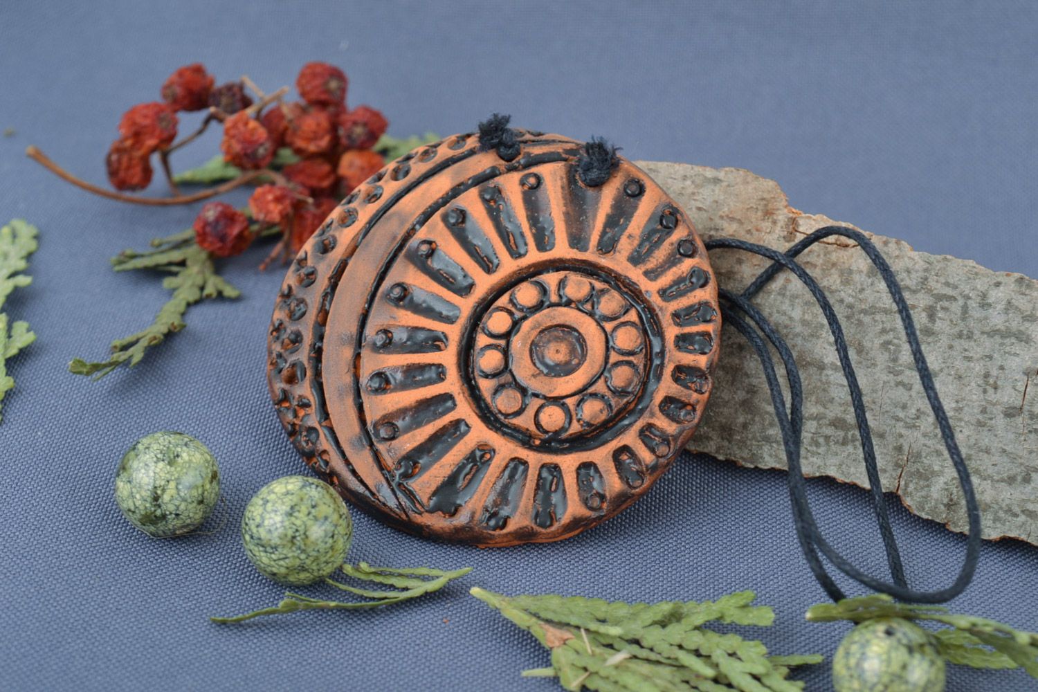 Handmade designer women's ethnic ceramic pendant of round shape on cord  photo 1