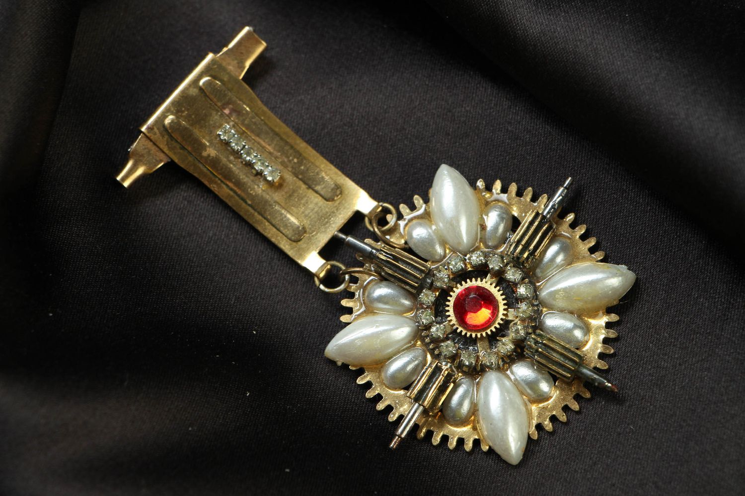 Metal brooch in steampunk style with clock details photo 1