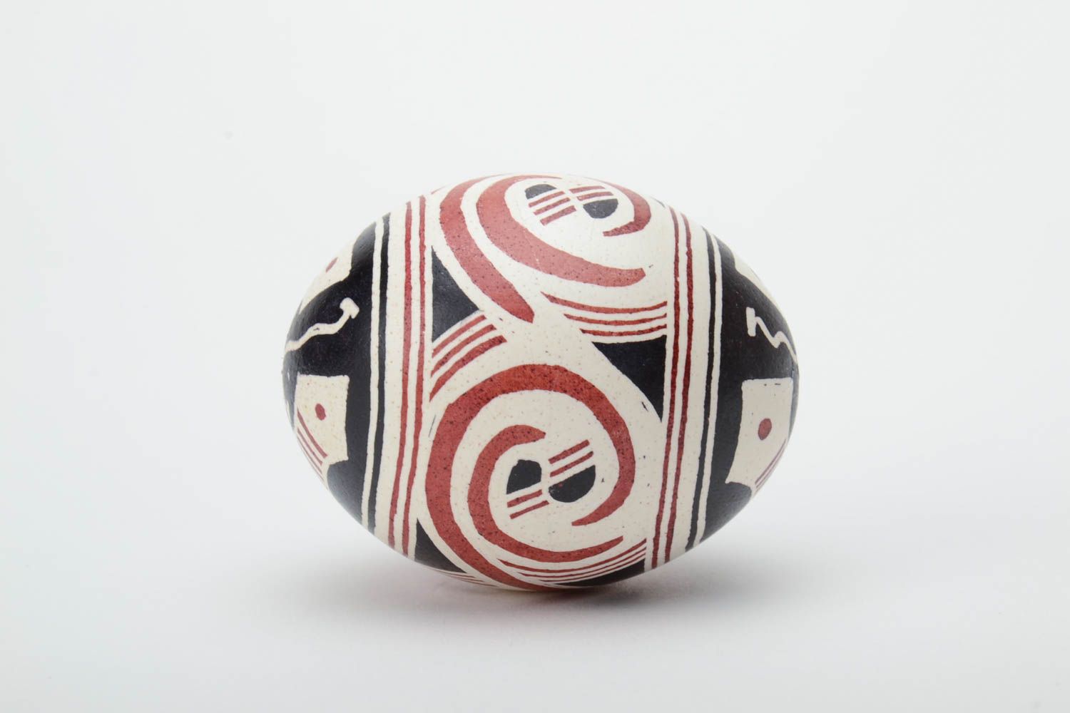 Black white and red handmade designer Easter egg painted using waxing technique photo 3
