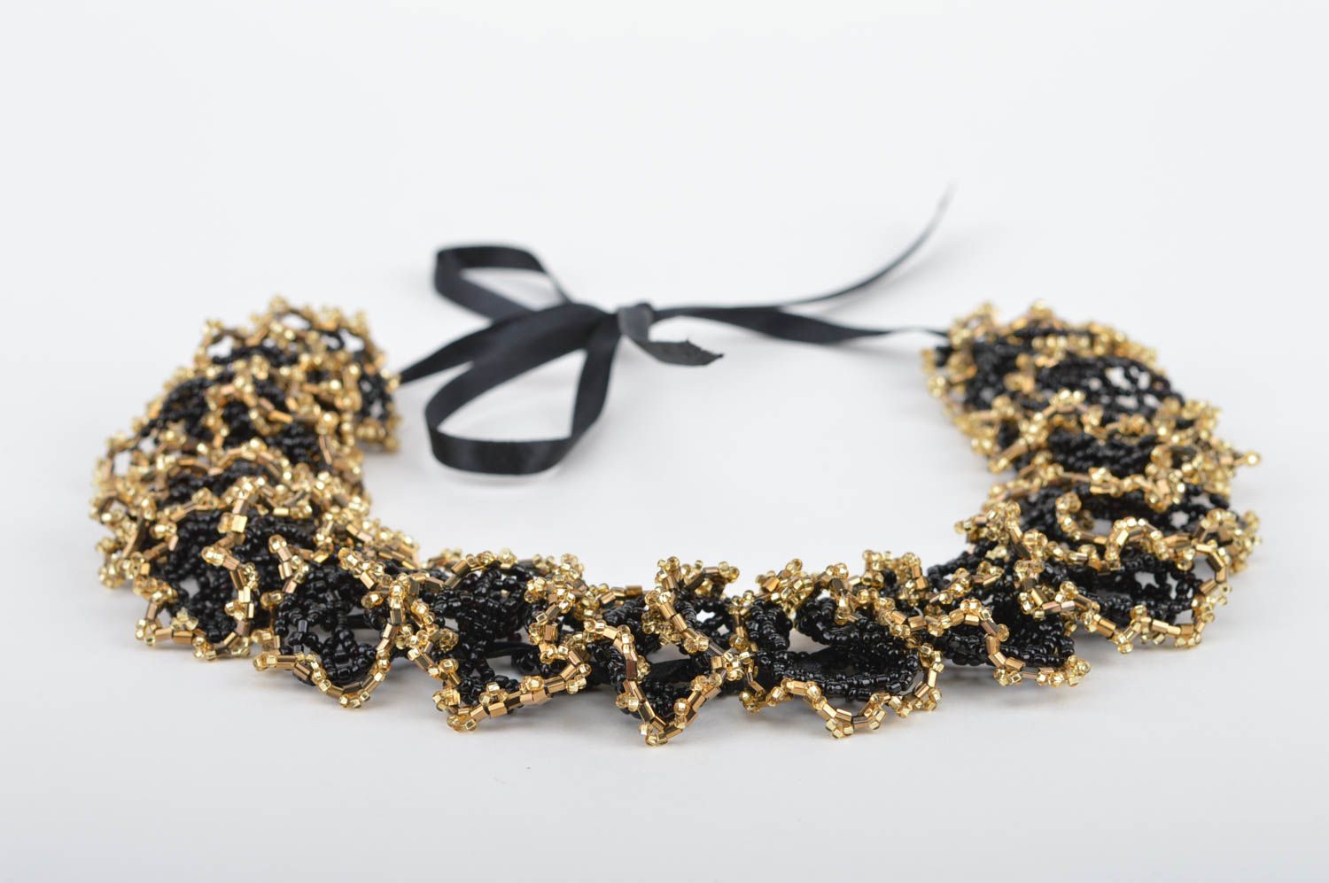 Beautiful handmade designer beaded airy necklace of black and gold colors photo 2
