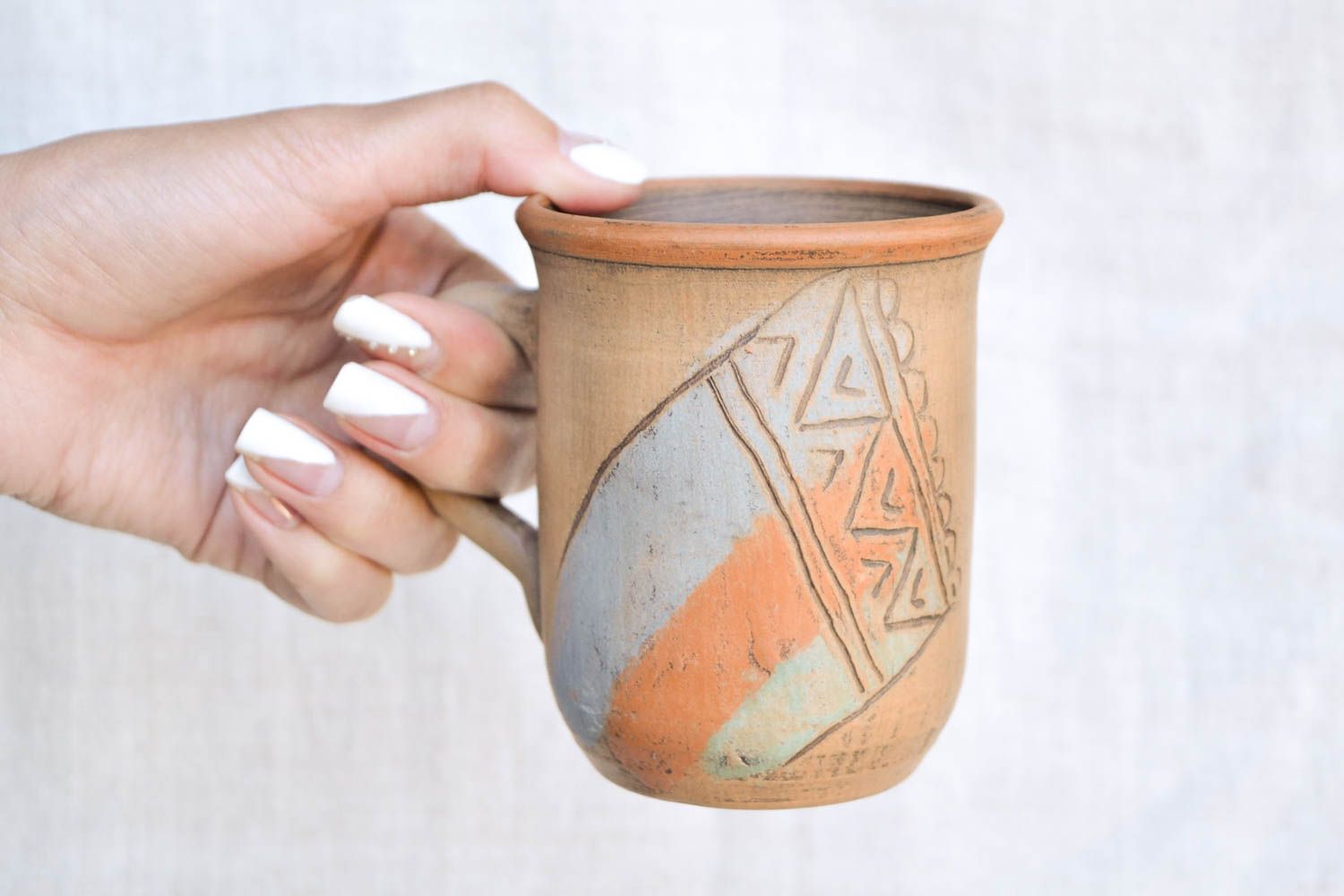Tall drinking mug in brown, orange, and olive colors photo 4