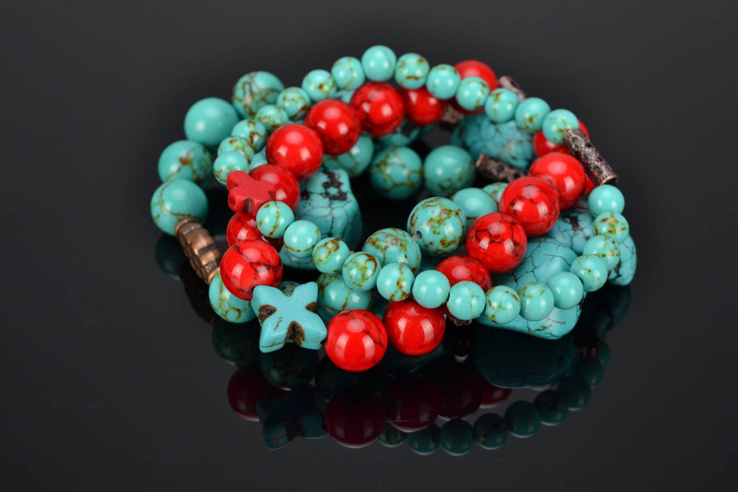 Natural stone bracelet of red and turquoise colors photo 1