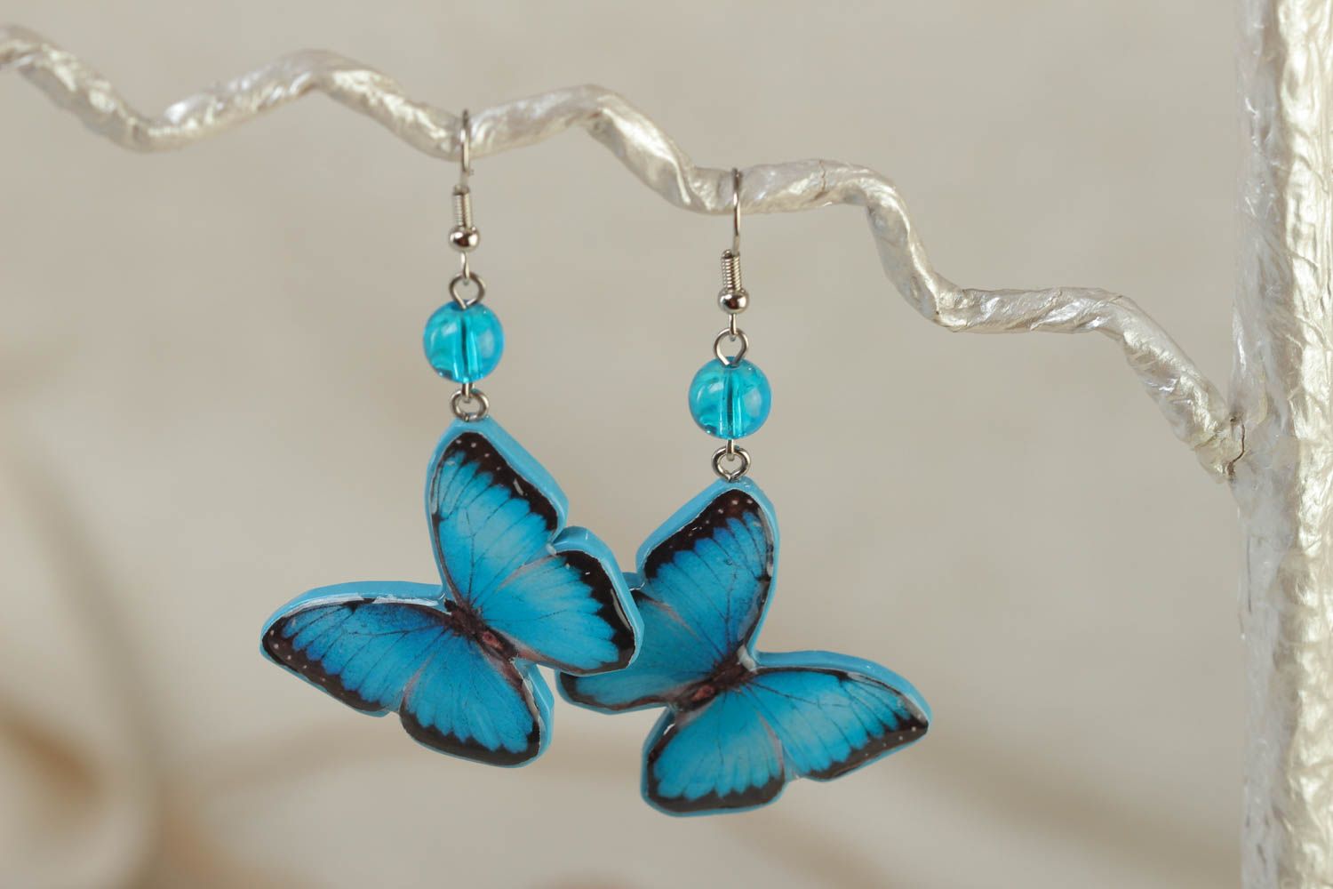 Unusual bright blue handmade polymer clay earrings in the shape of butterflies for summer photo 1