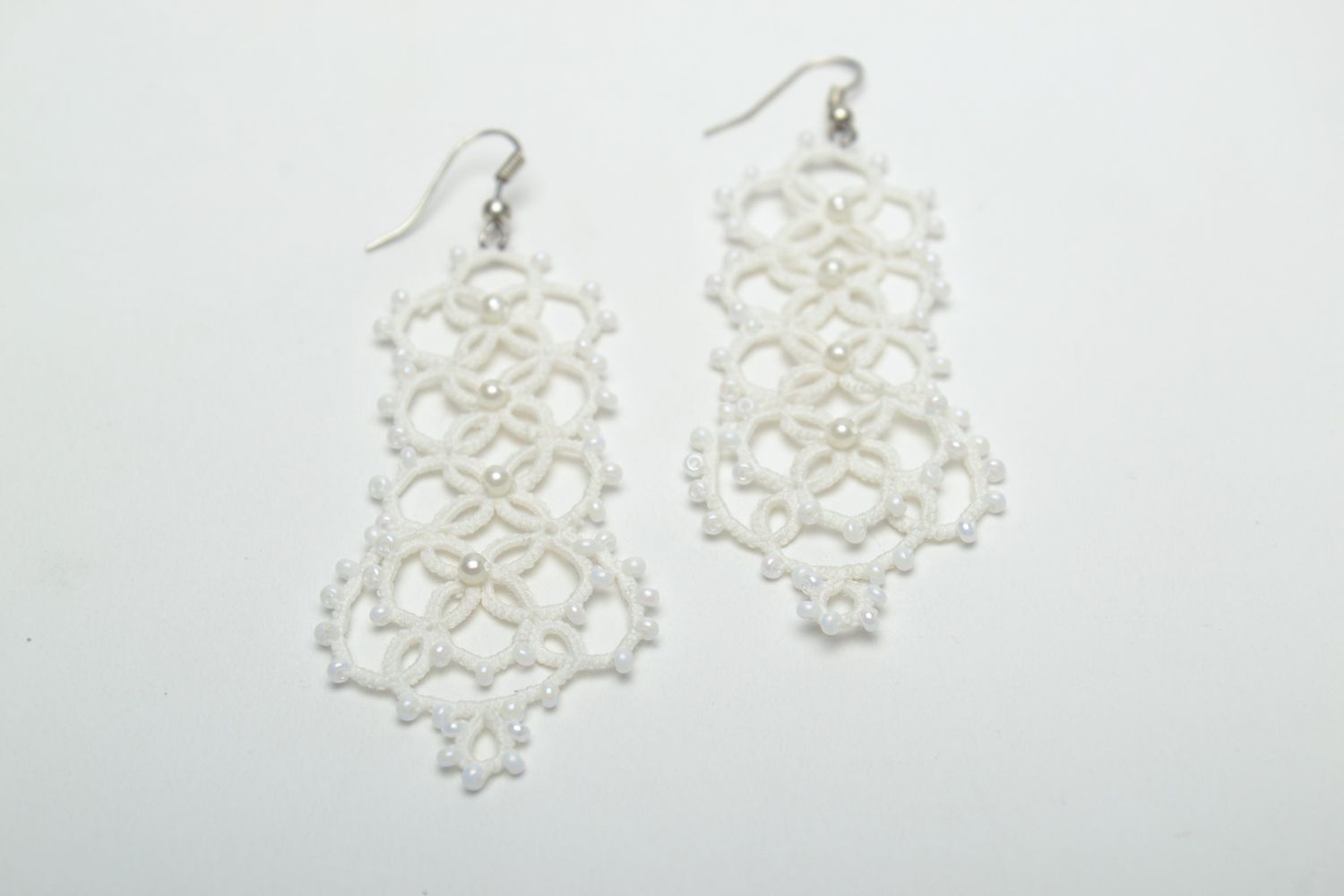 Woven earrings with beads made using tatting technique photo 2