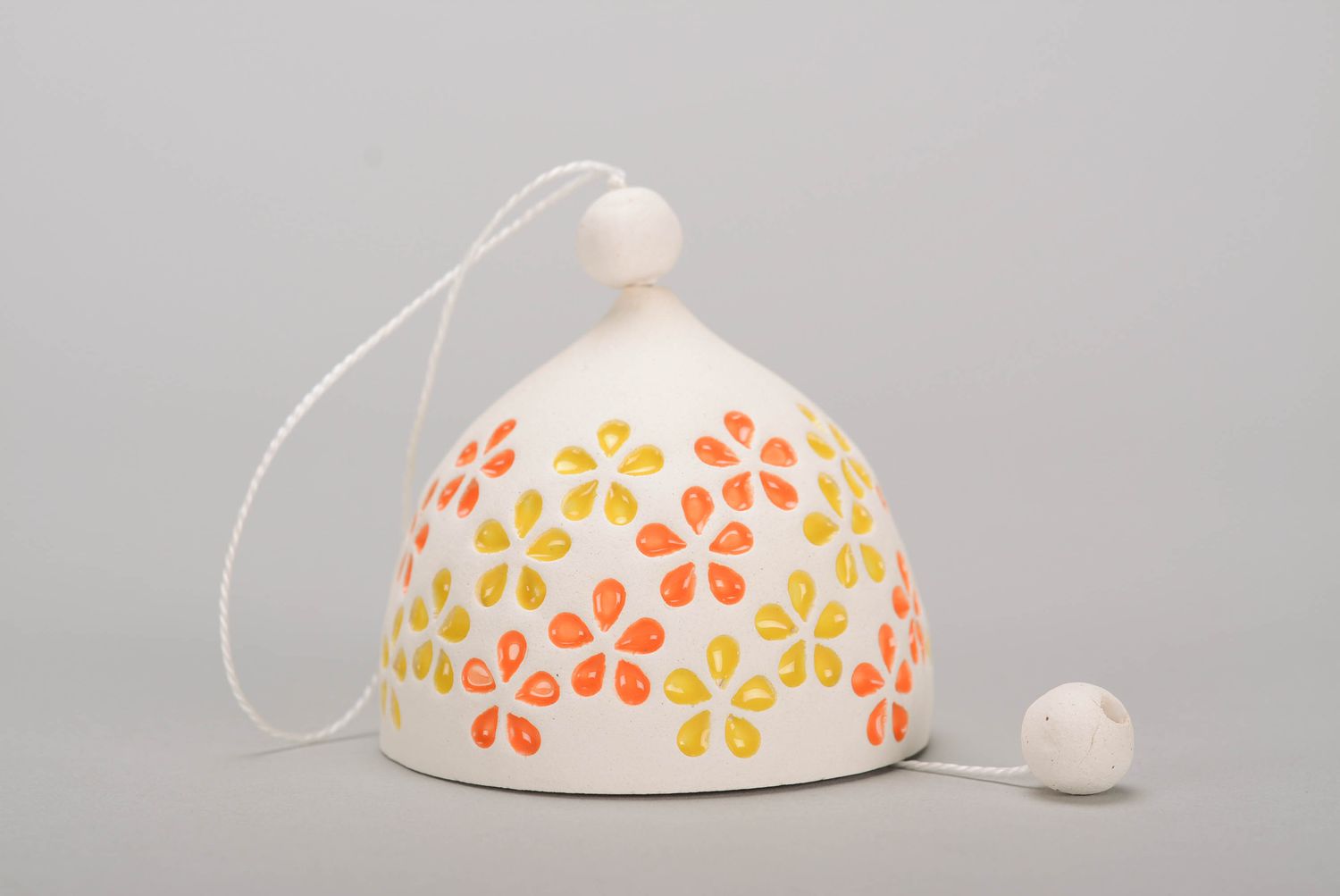 White clay bell with stamping photo 1