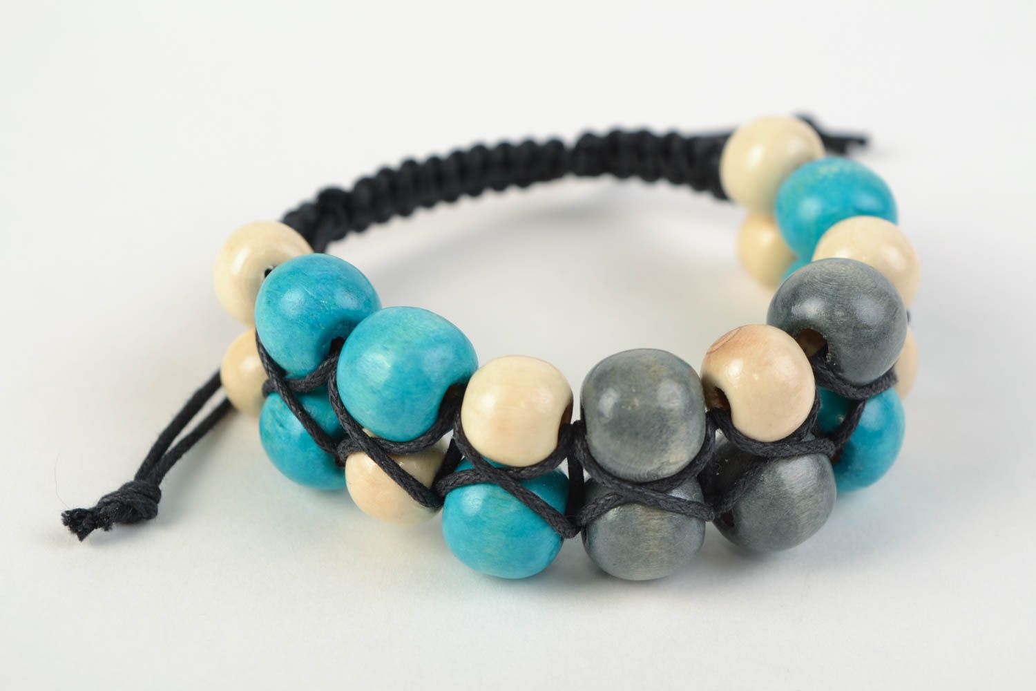 Bracelet en perles de bois multicolores et lacet noir original fait main photo 1