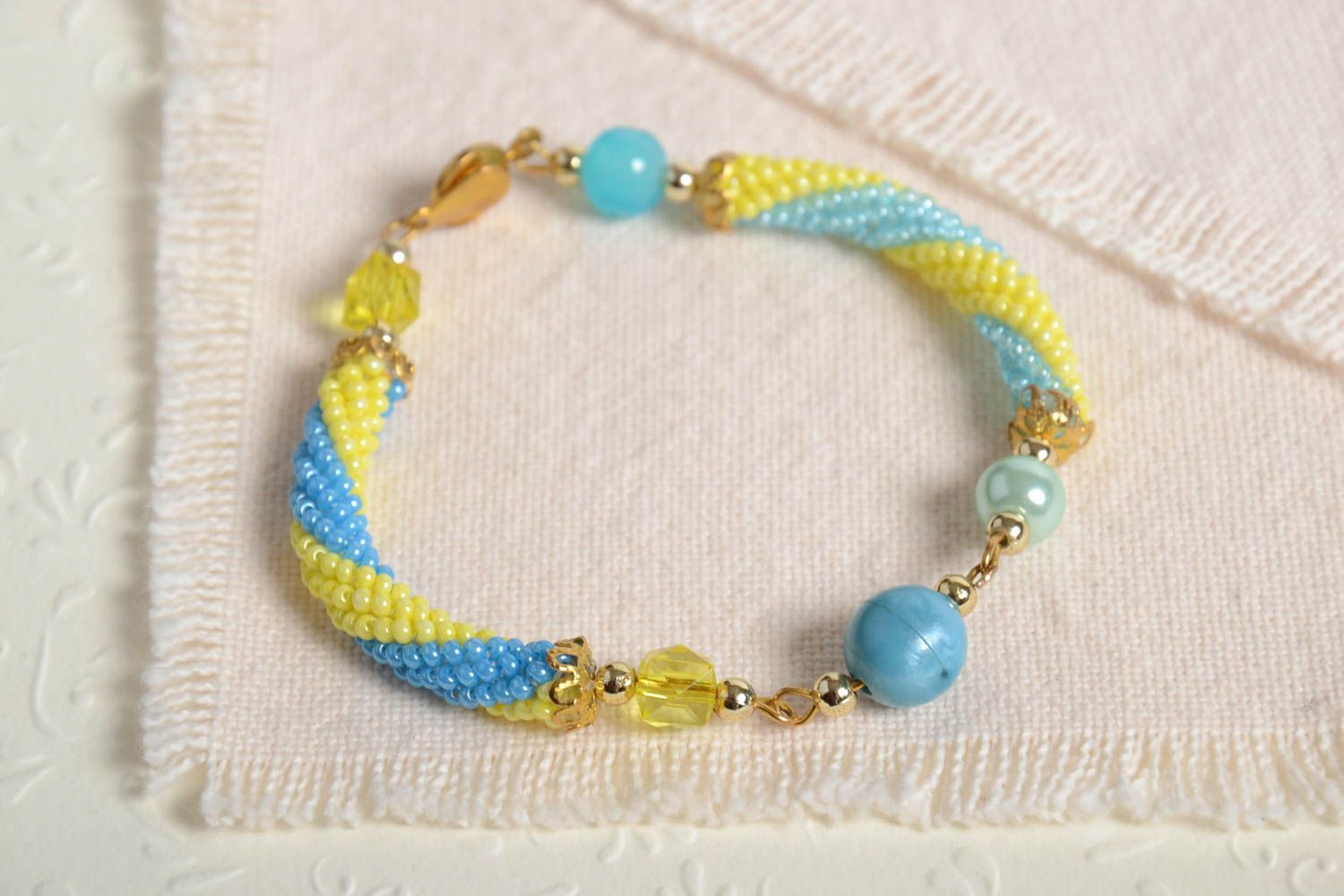 Blue and yellow beads cord all-size bracelet for girls photo 1
