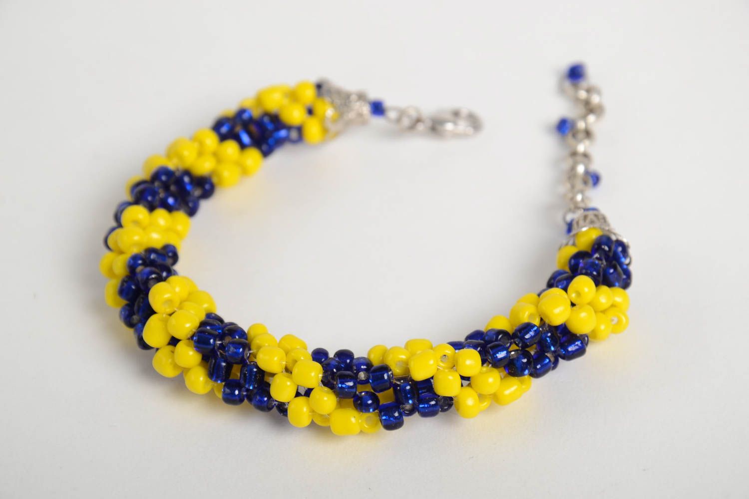 Cord beaded elegant bracelet in yellow and dark blue color photo 4