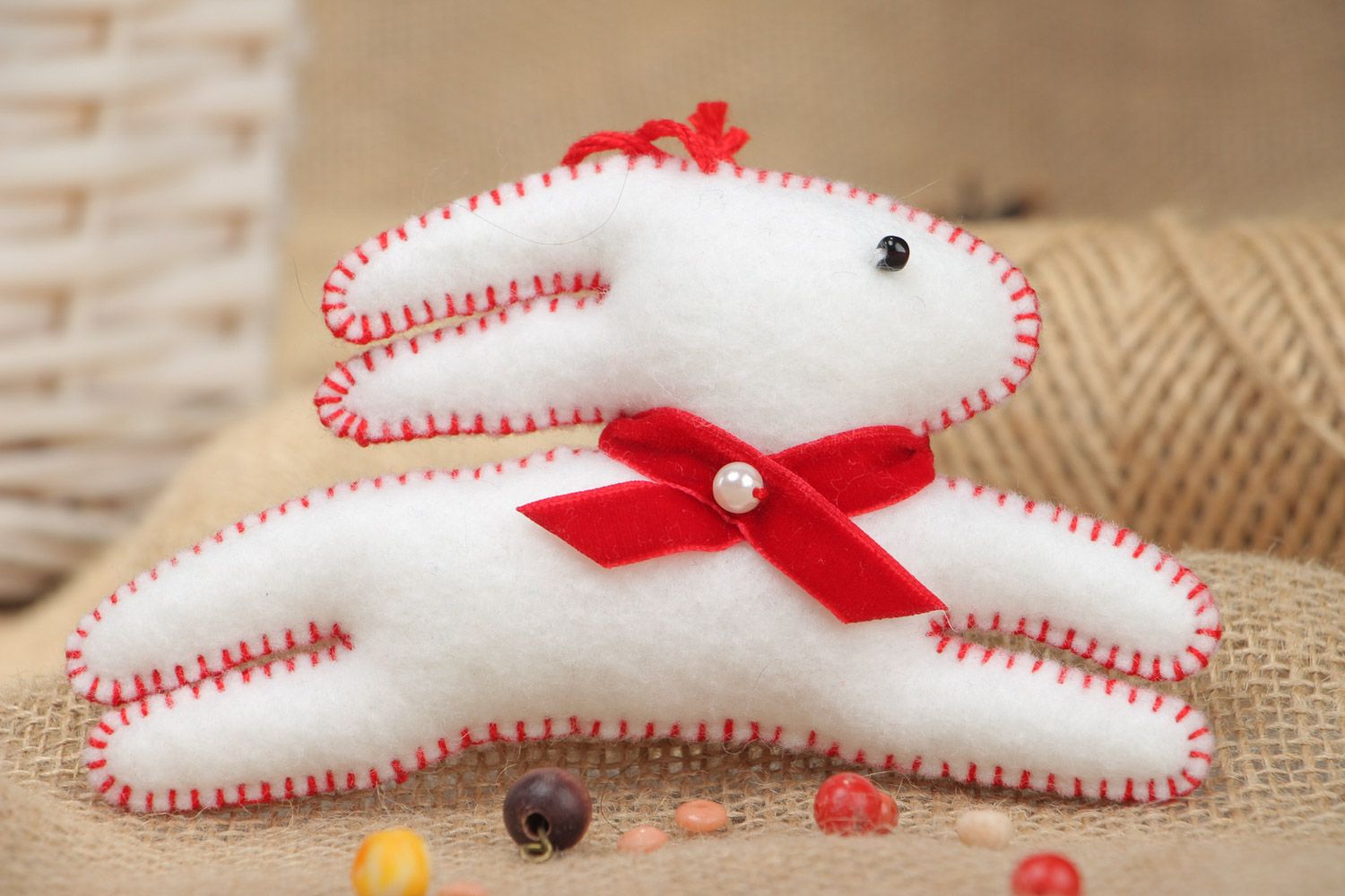 Handmade white decorative toy Rabbit sewn of felt with eyelet interior decoration photo 1