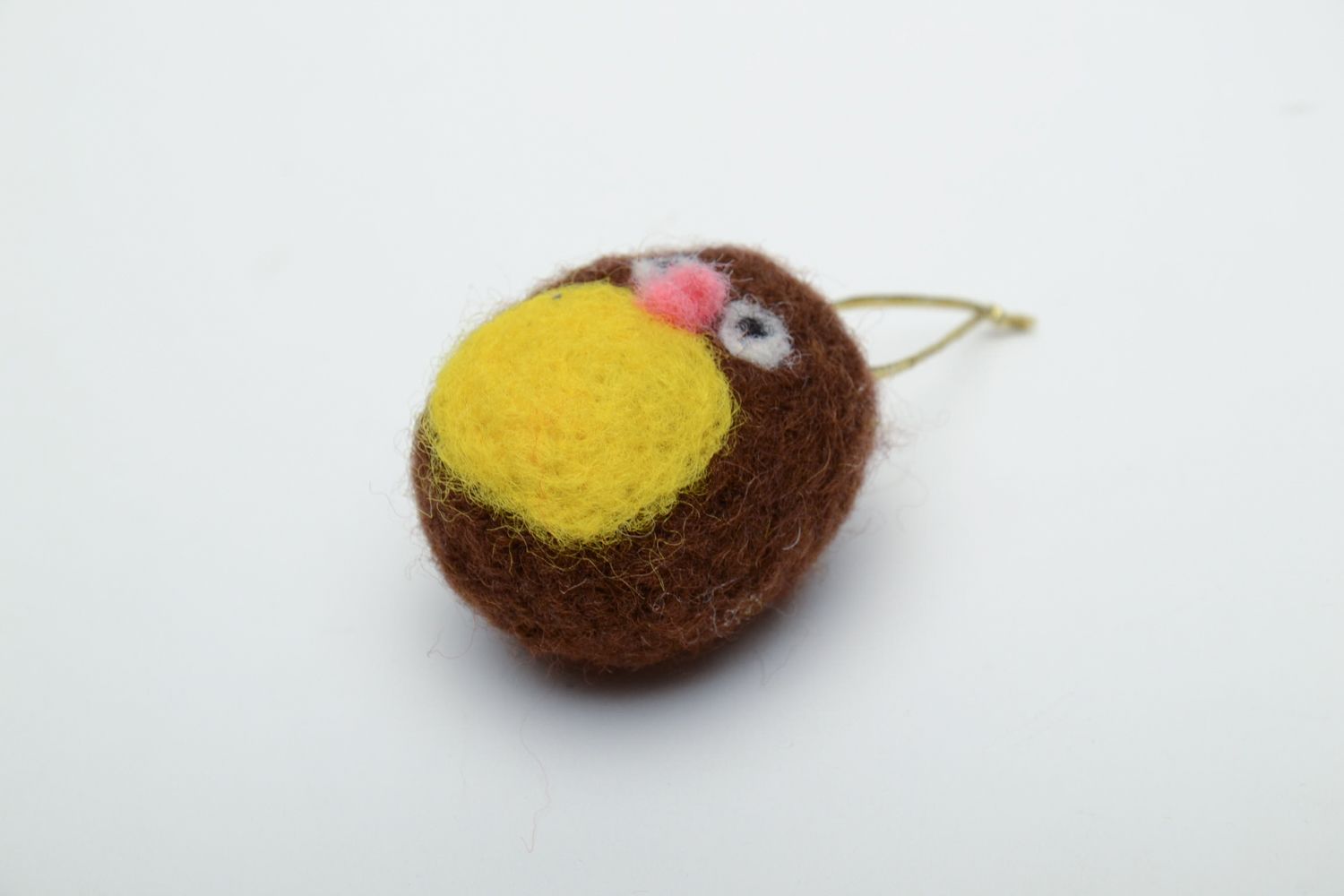 Small felted toy with eyelet photo 2