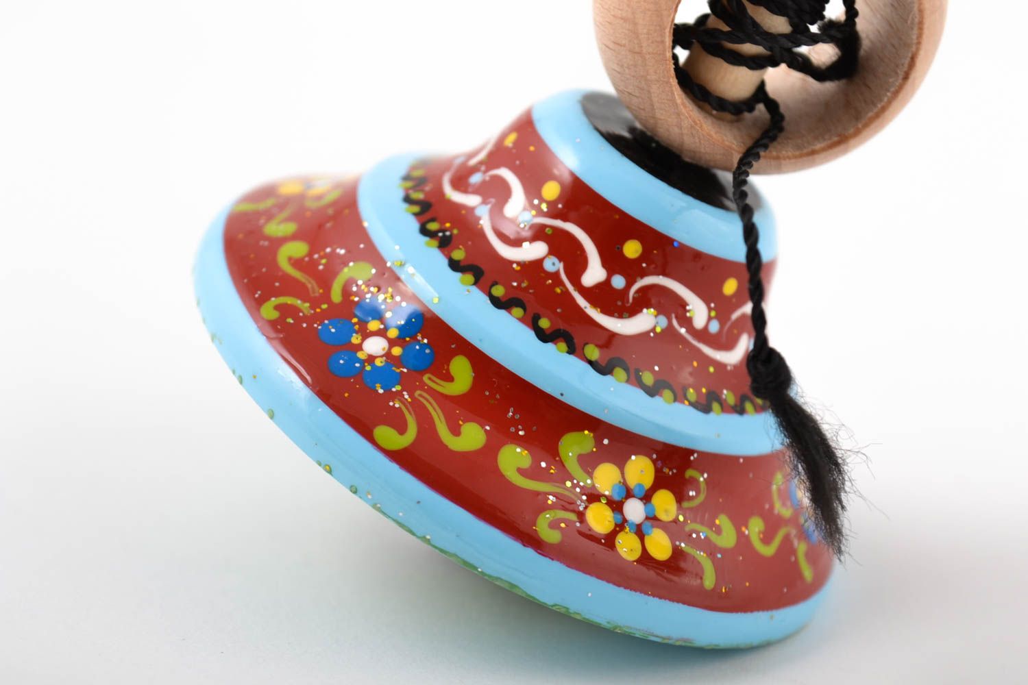 Trompo de madera hecho a mano regalo original juguete para niños con ornamentos foto 4