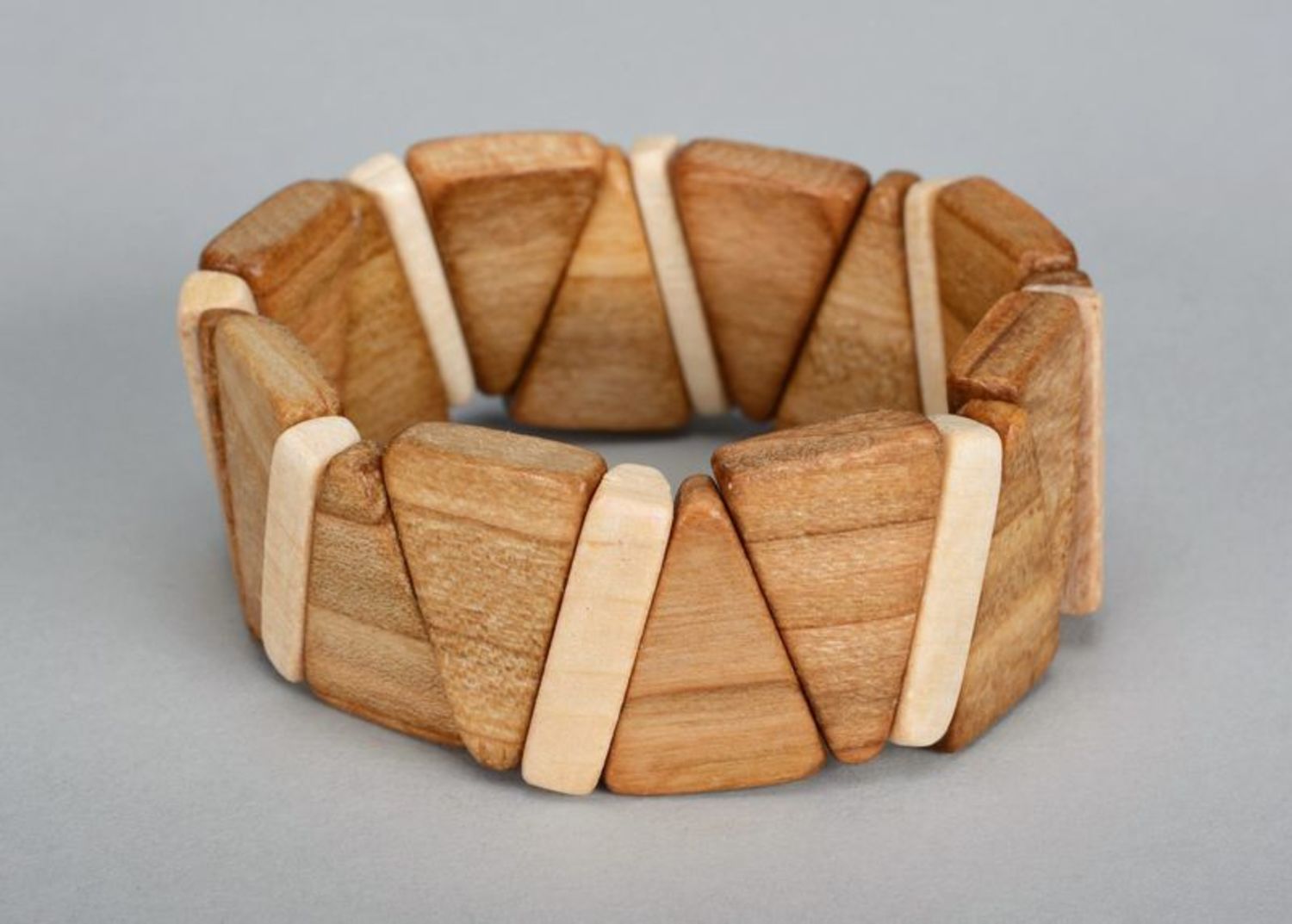 Wooden bracelet on elastic band made from triangular pieces photo 2