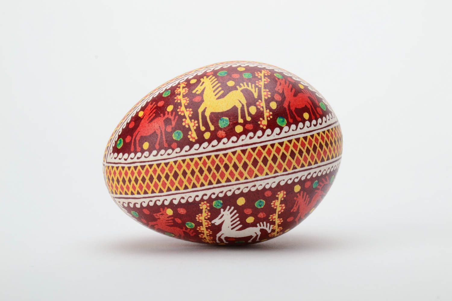 Homemade designer painted Easter egg with horse pattern created using waxing technique photo 3