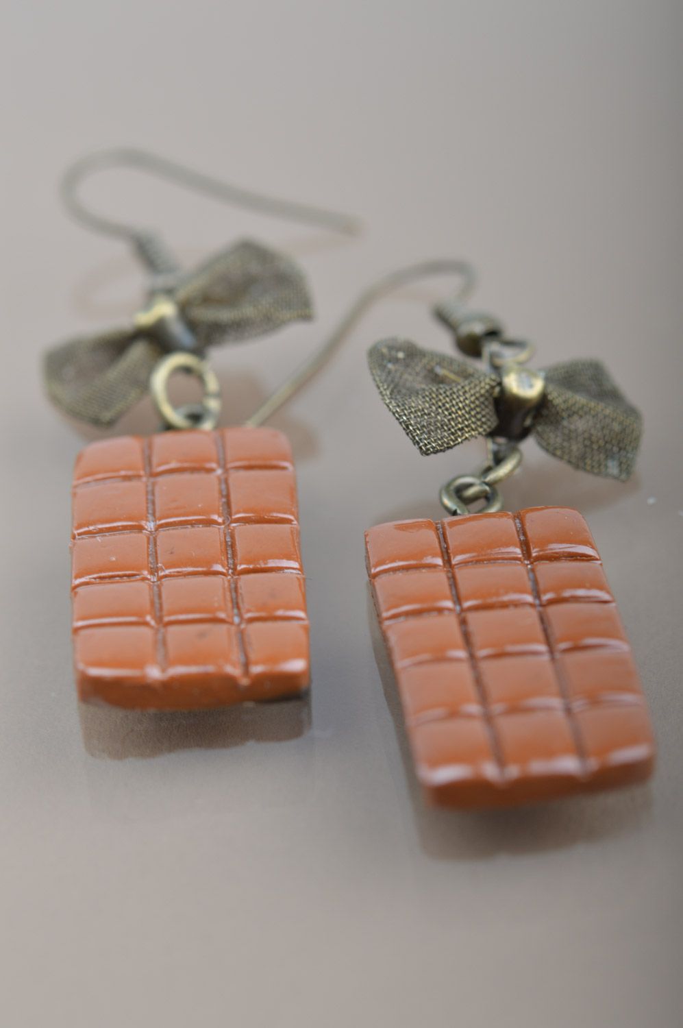 Homemade plastic earrings with charms in the shape of chocolate bars photo 5