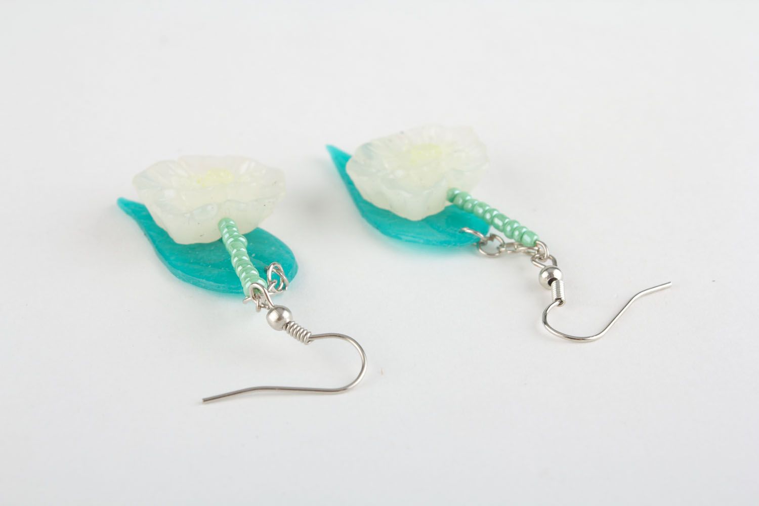 Plastic earrings with charms photo 1