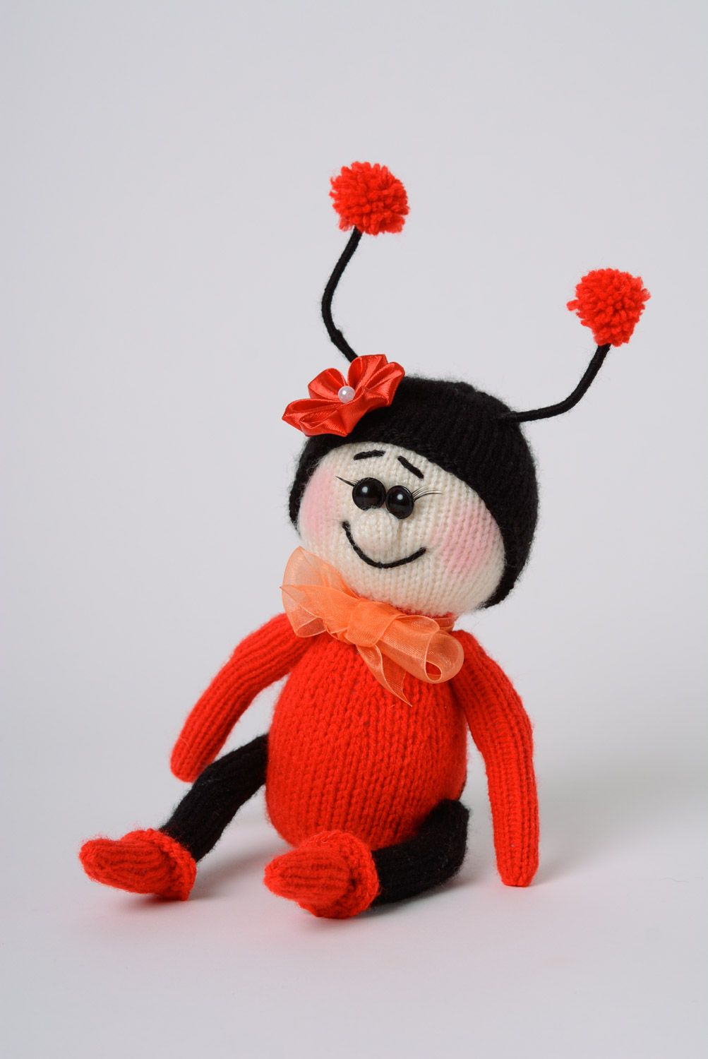 Red and black handmade soft toy crochet of acrylic threads photo 1