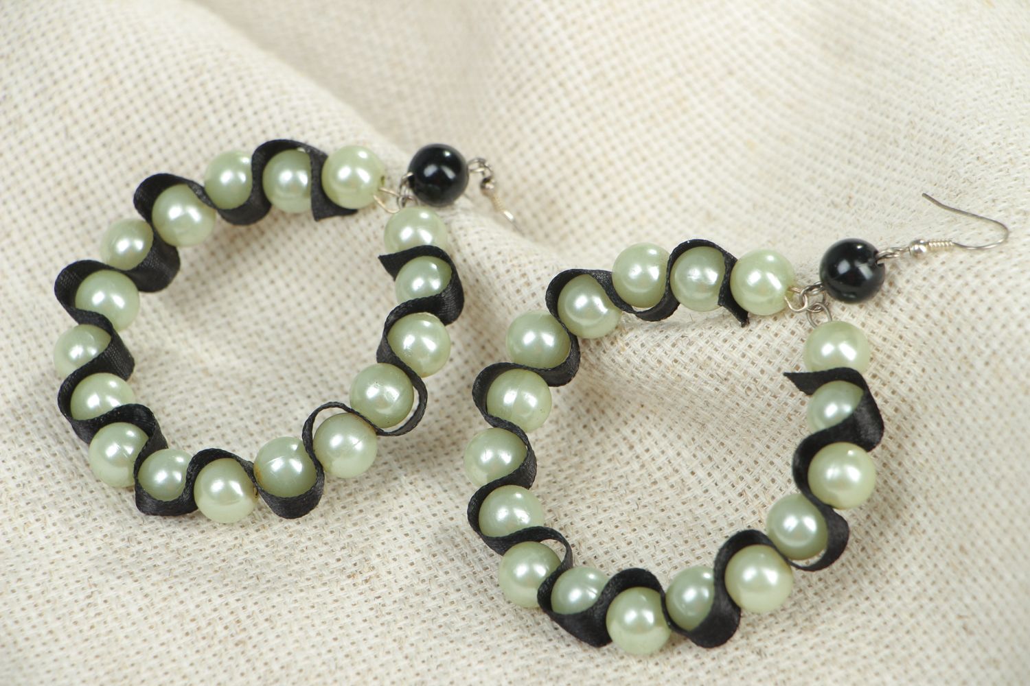 Large hoop earrings with pearl-like beads photo 4