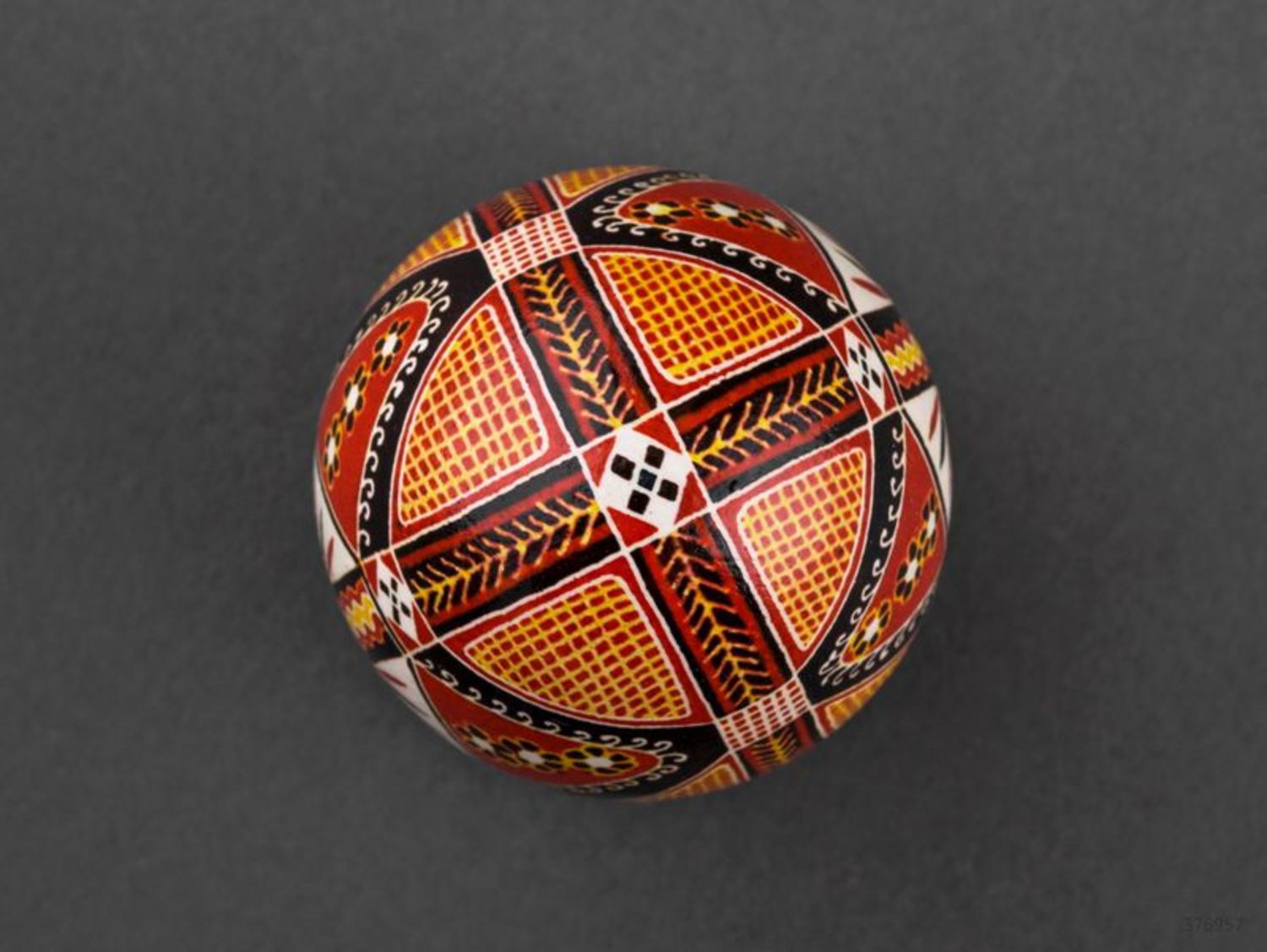 Painted Easter egg with colorful ornaments in ethnic style for present photo 4