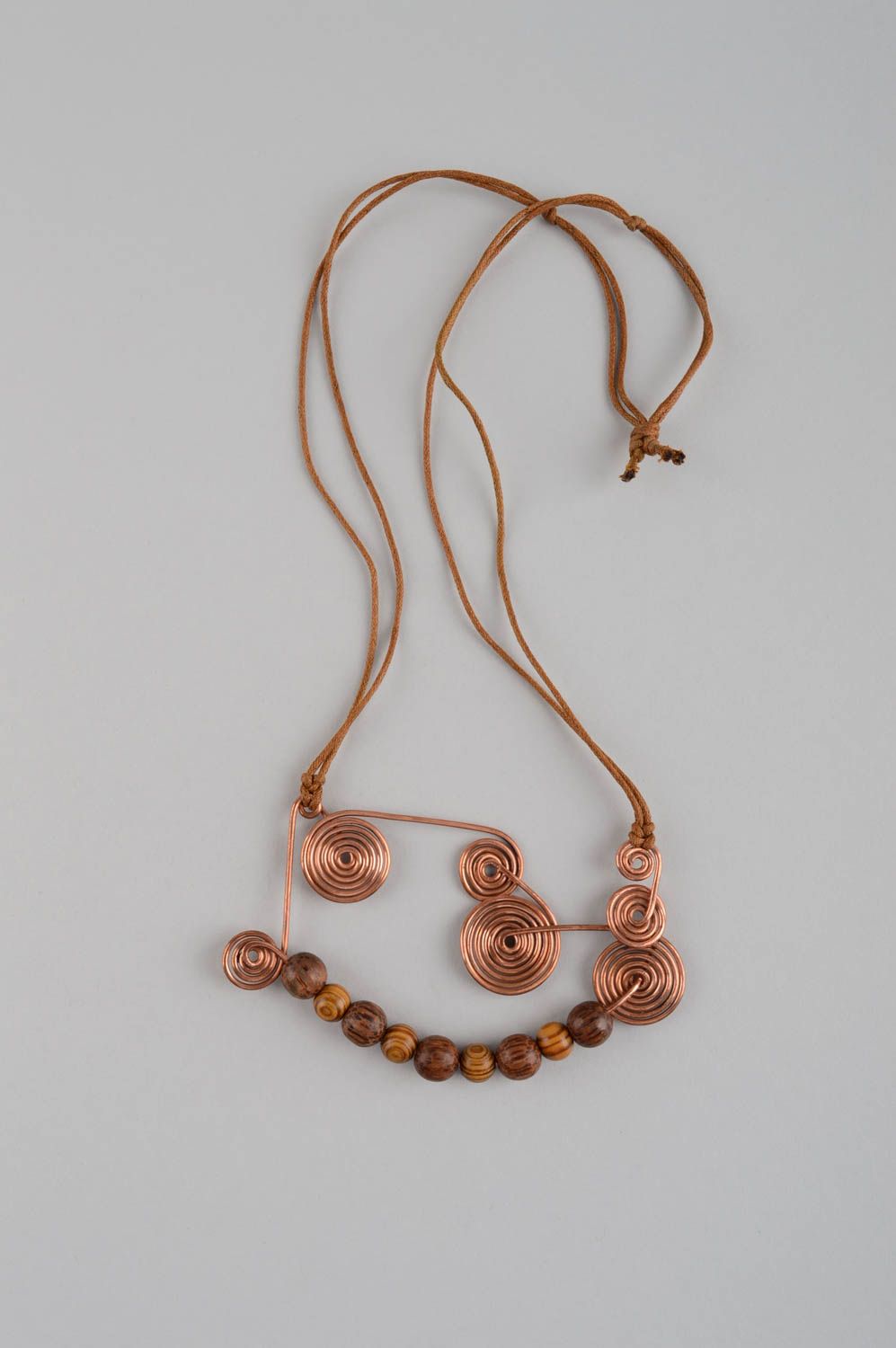 Beautiful women's handmade design pendant with wooden beads and copper elements photo 2