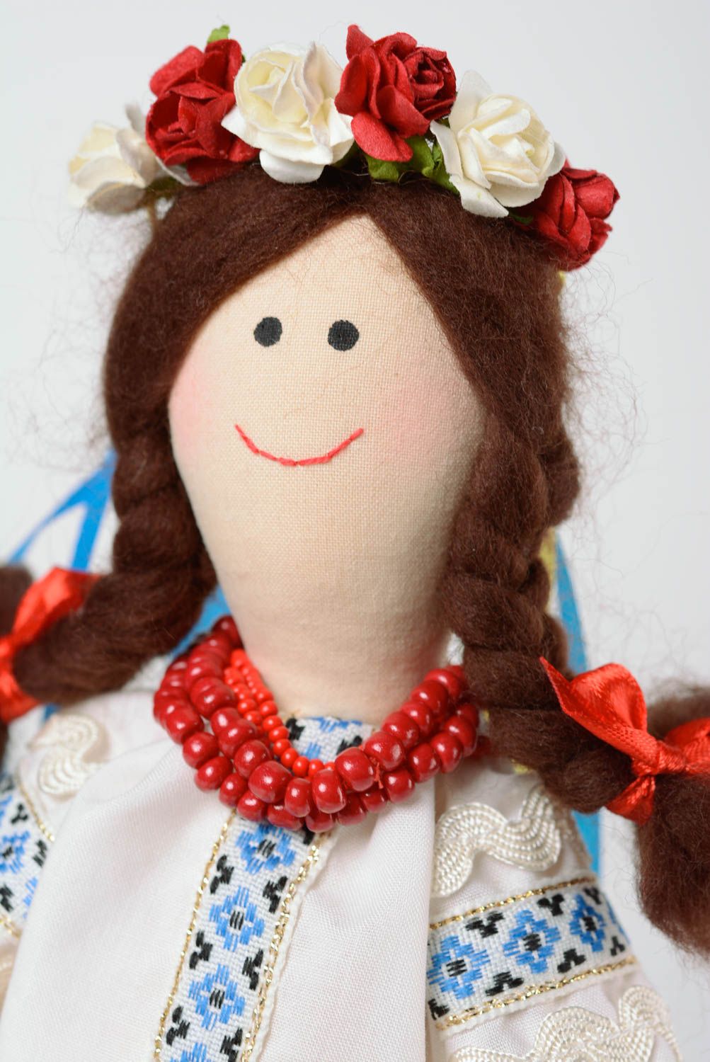 Handmade fabric soft doll Ukrainian girl in traditional costume with head wreath photo 2