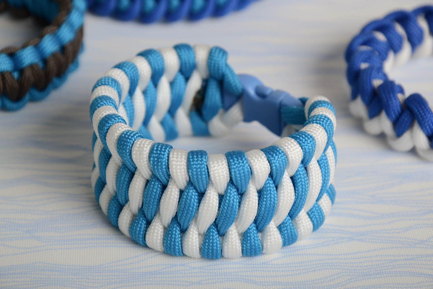 Blue handmade survival bracelet woven of American paracord  photo 1