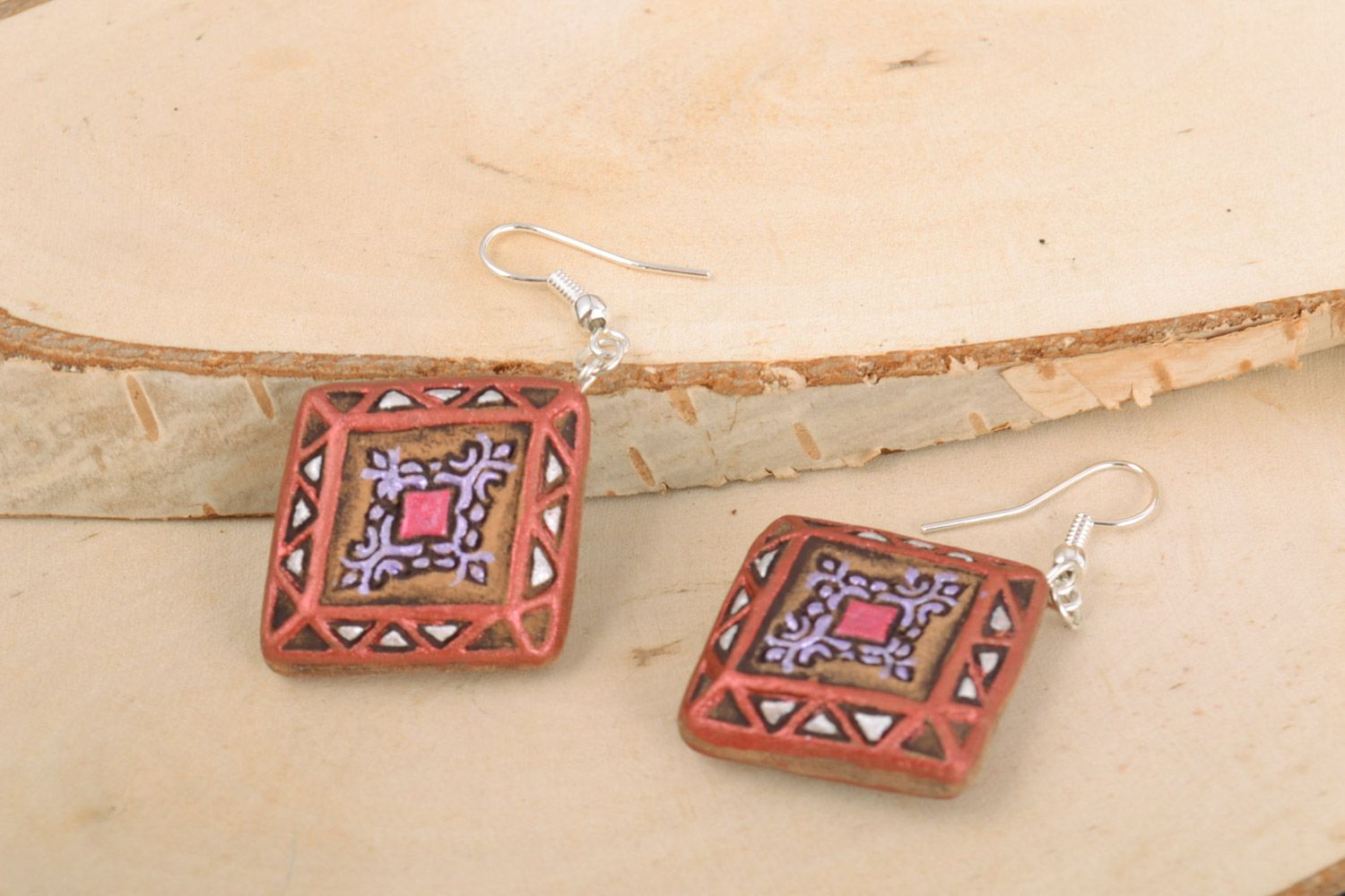 Handmade small cute painted ceramic dangling earrings in the shape of rhombuses  photo 1