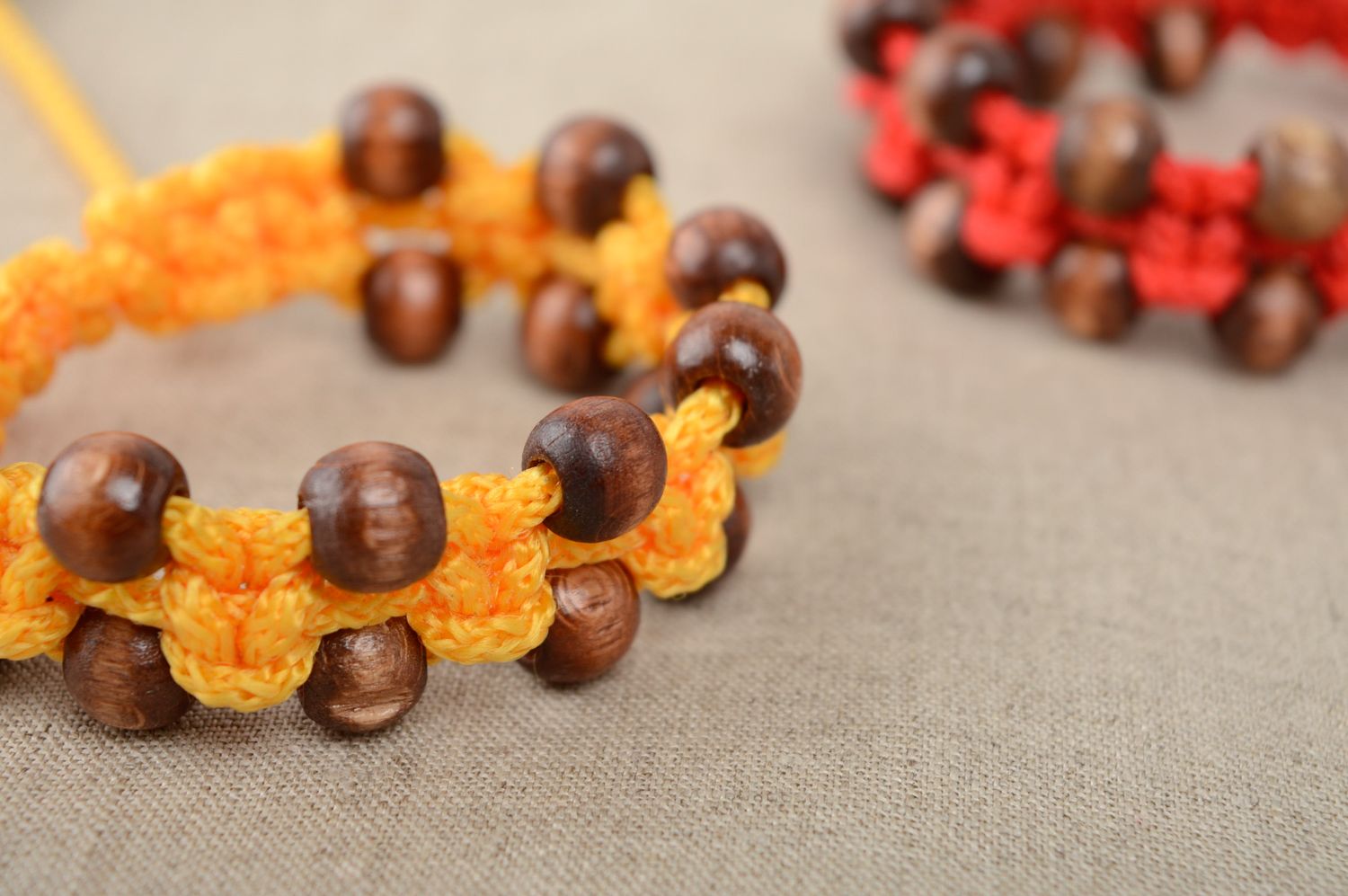 Macrame polyester cord bracelet of yellow color with wooden beads photo 5