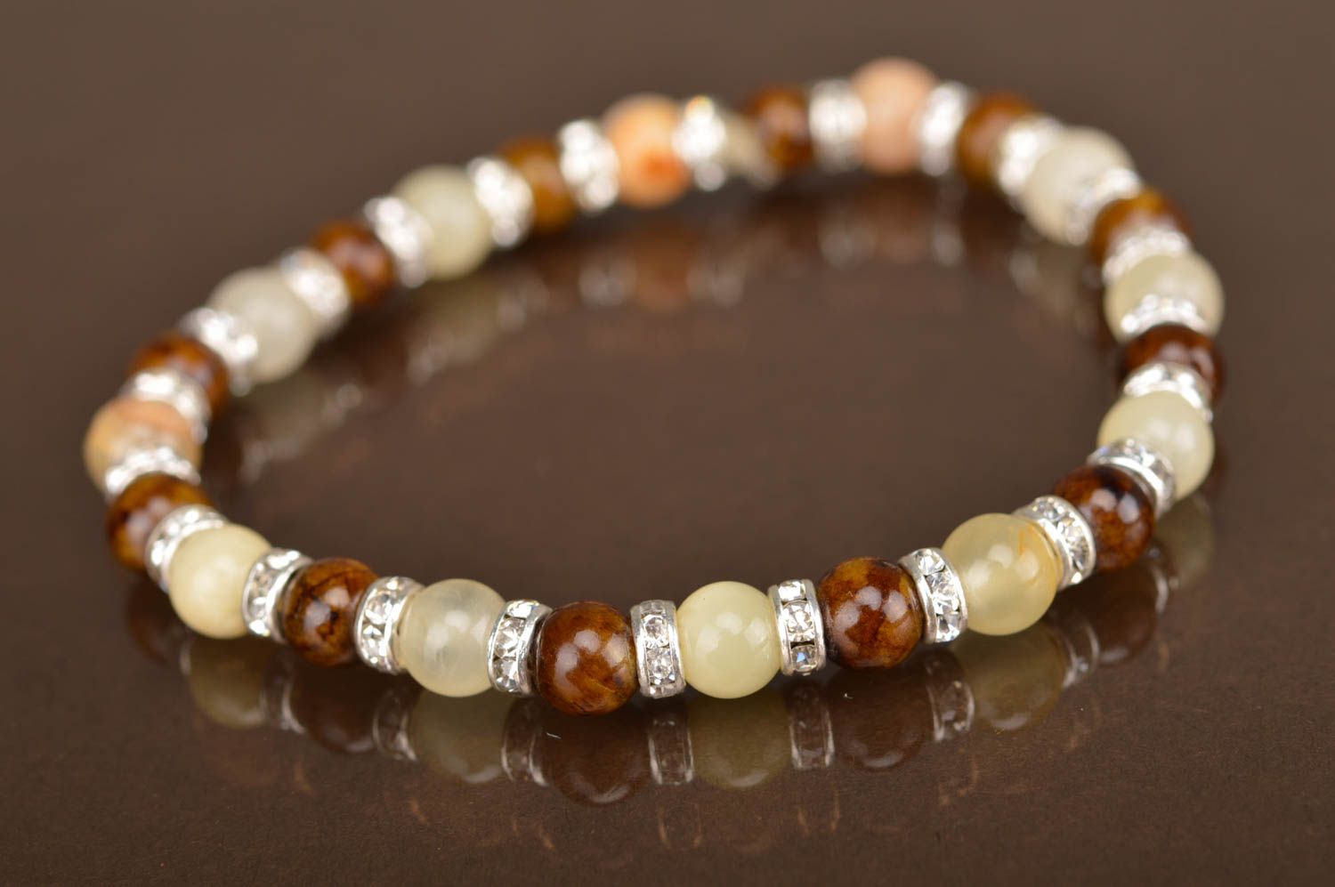 Beautiful handmade stylish women's glass bead bracelet brown and beige photo 3