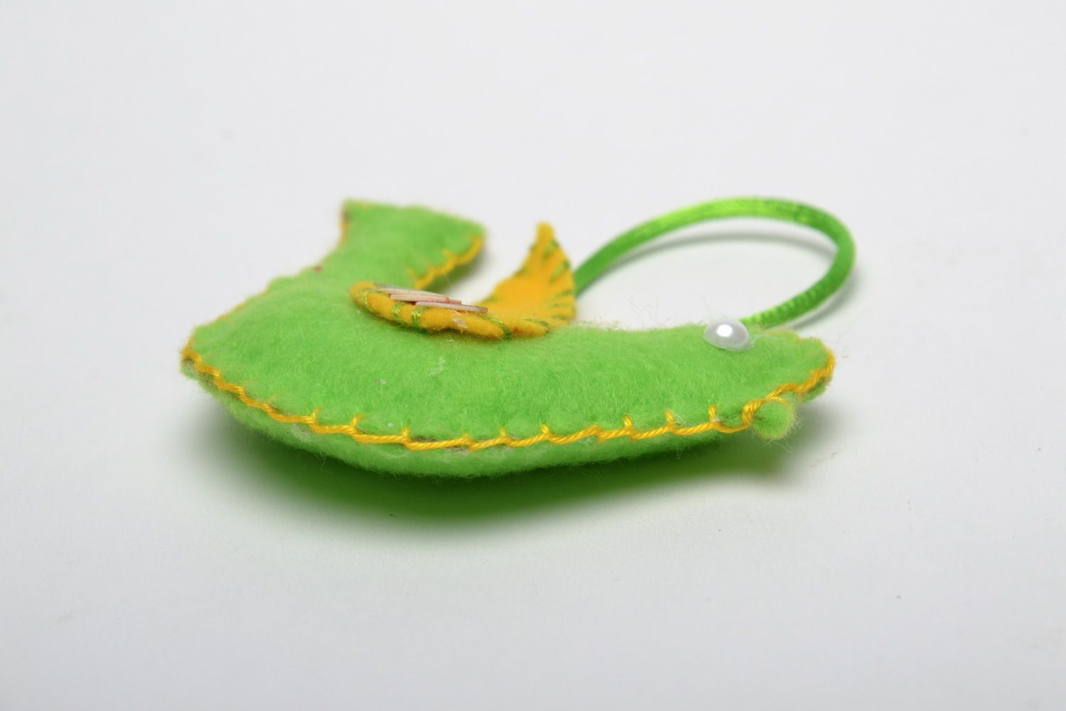 Handmade interior soft decoration sewn of fleece in the shape of bird of green color photo 2
