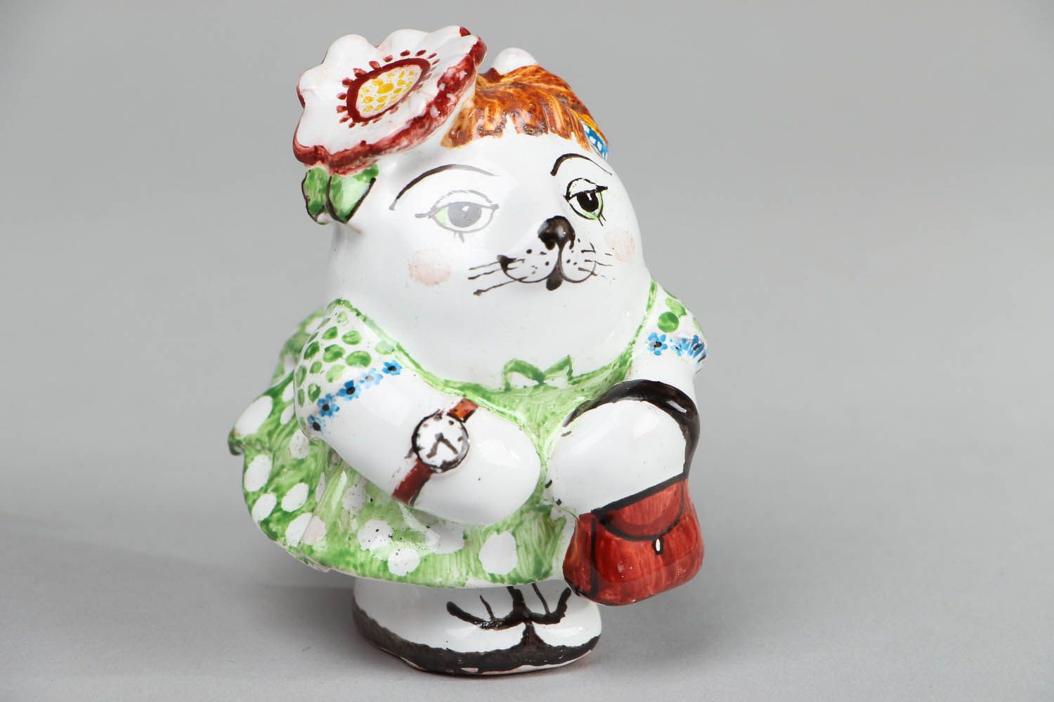 Ceramic statuette Kitty with a purse photo 1