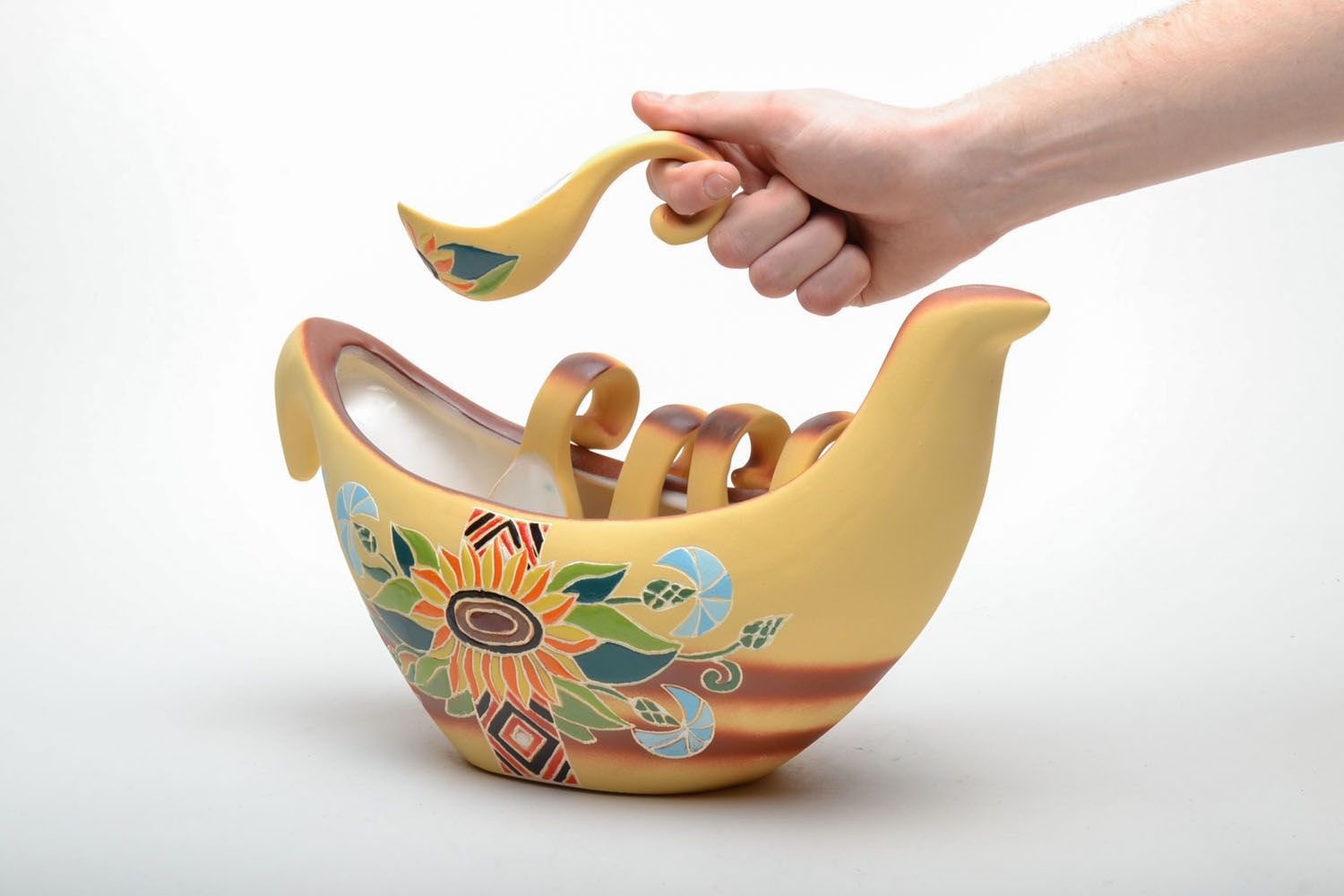 Ceramic pot with spoons photo 5