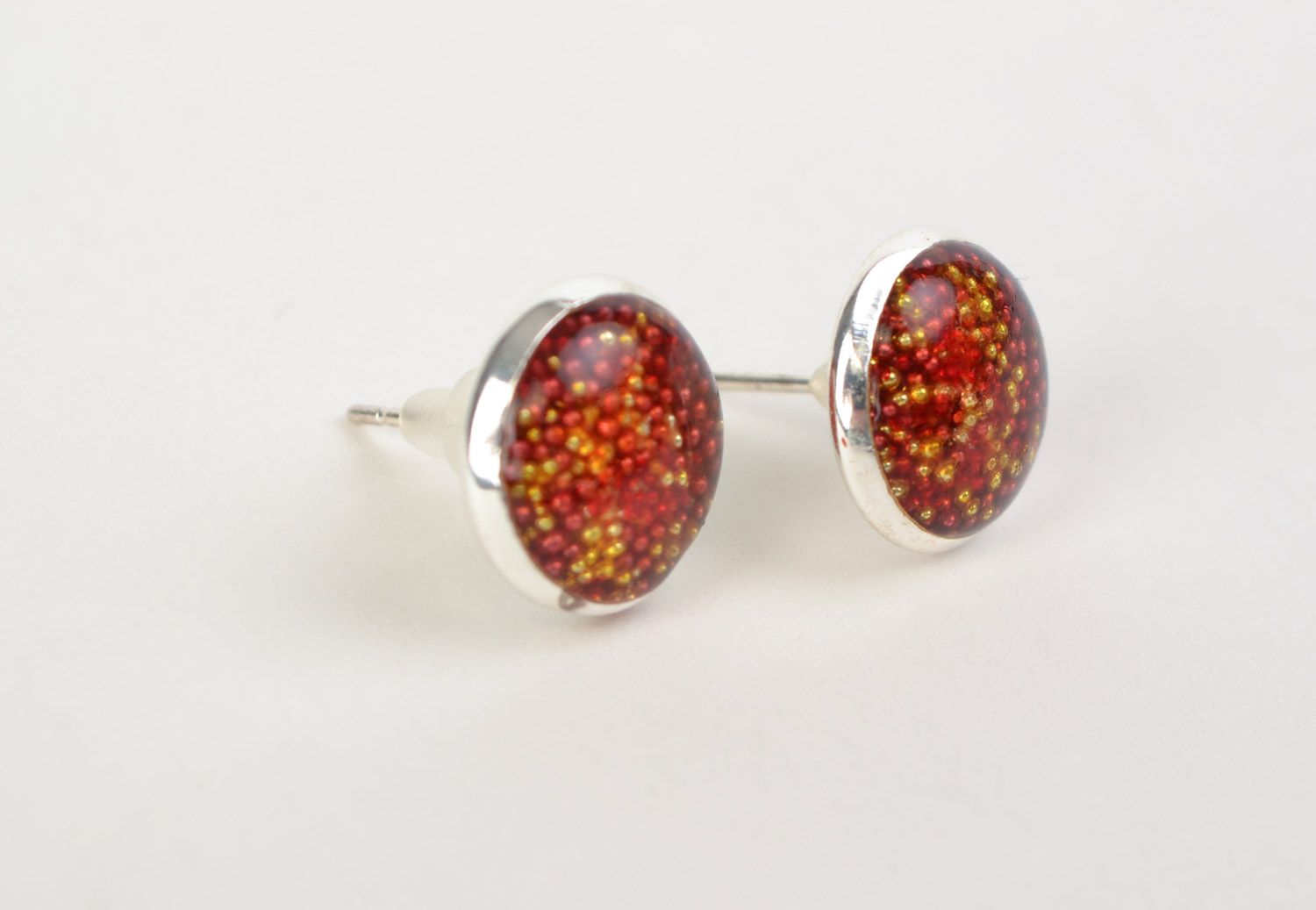 Handmade round epoxy resin stud earrings of red and yellow colors for women photo 1