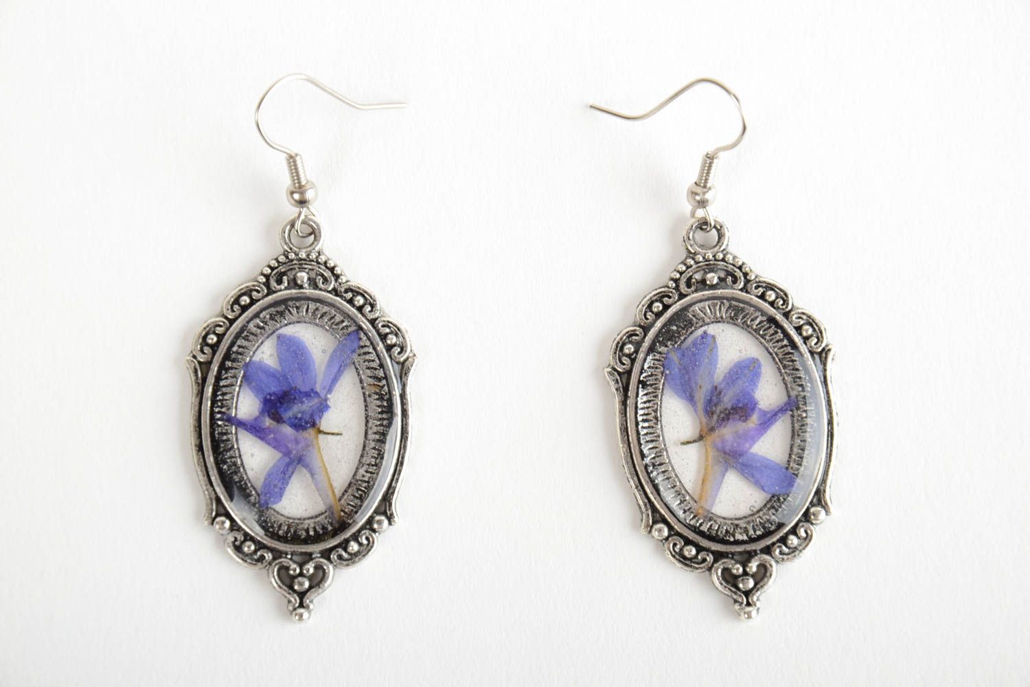 Handmade oval metal earrings in vintage style with flowers in epoxy resin photo 5