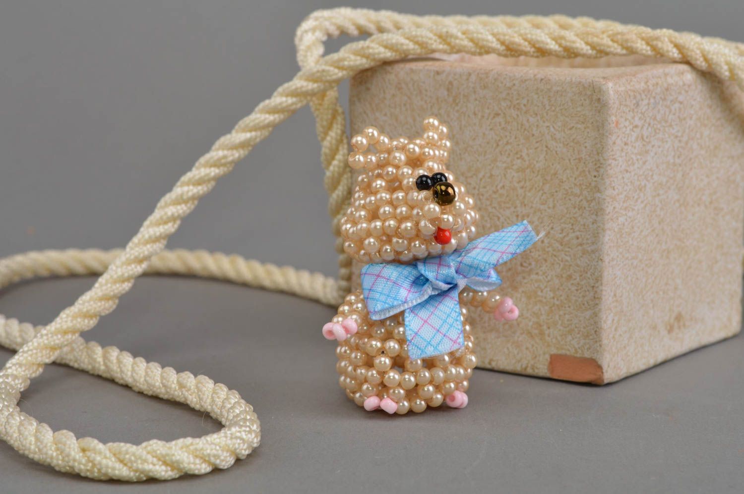 Small handmade collectible beaded statuette of cream colored bear for home decor photo 1