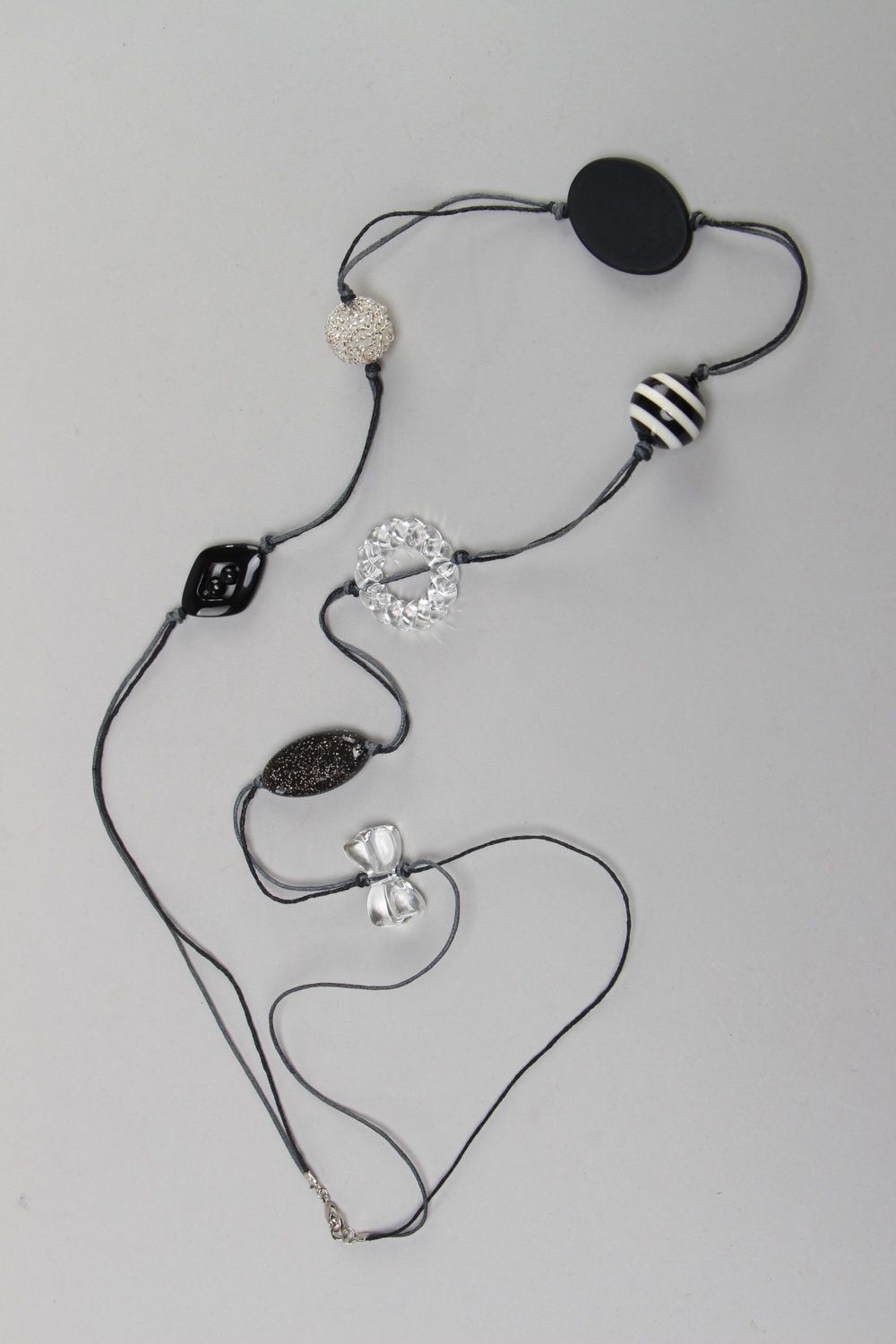 Handmade long black and white necklace with plastic beads of different shapes  photo 1