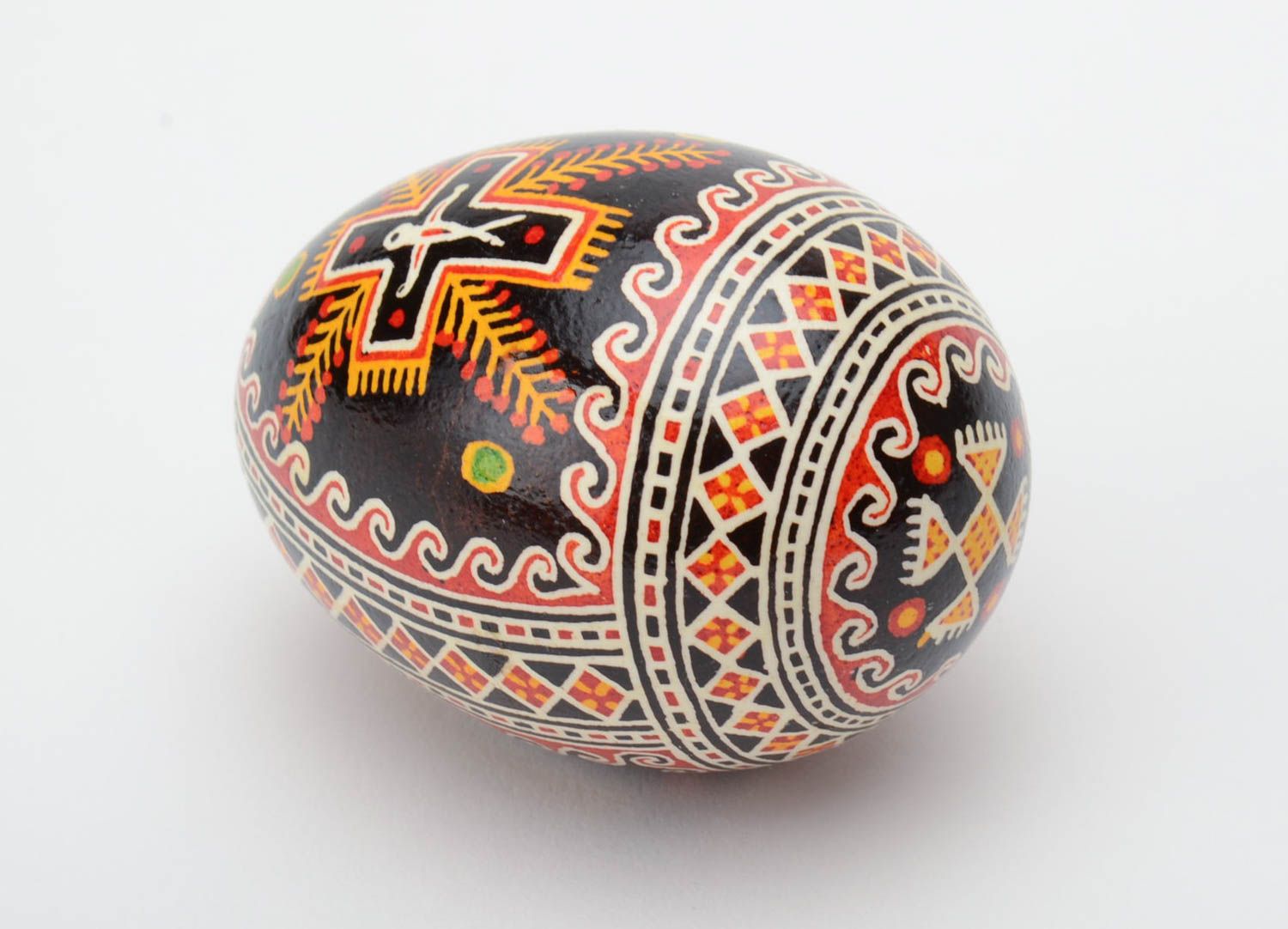 Handmade decorative painted Easter egg with black background and church image photo 4