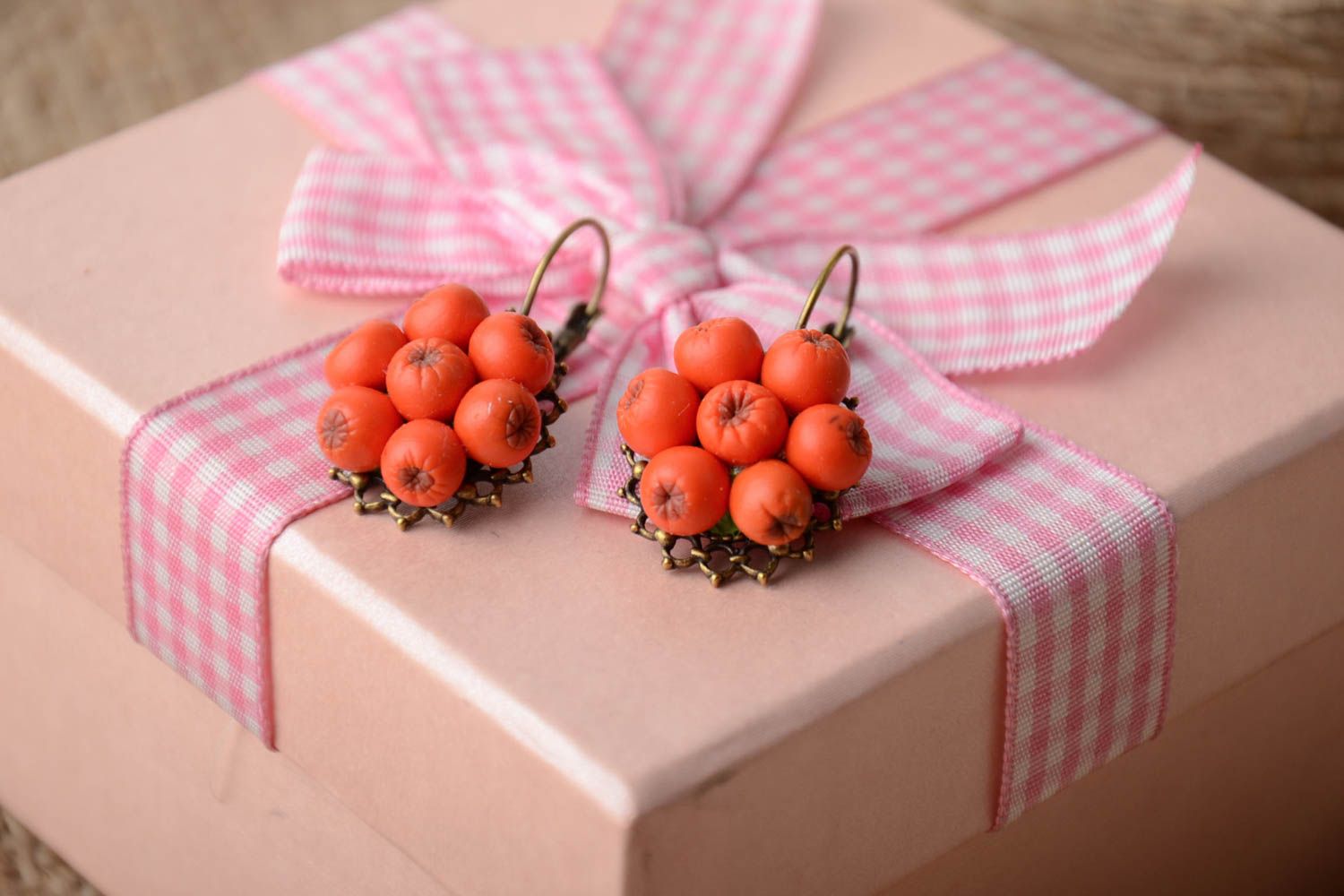 Handmade designer dangling earrings with cold porcelain berries of orange color photo 1