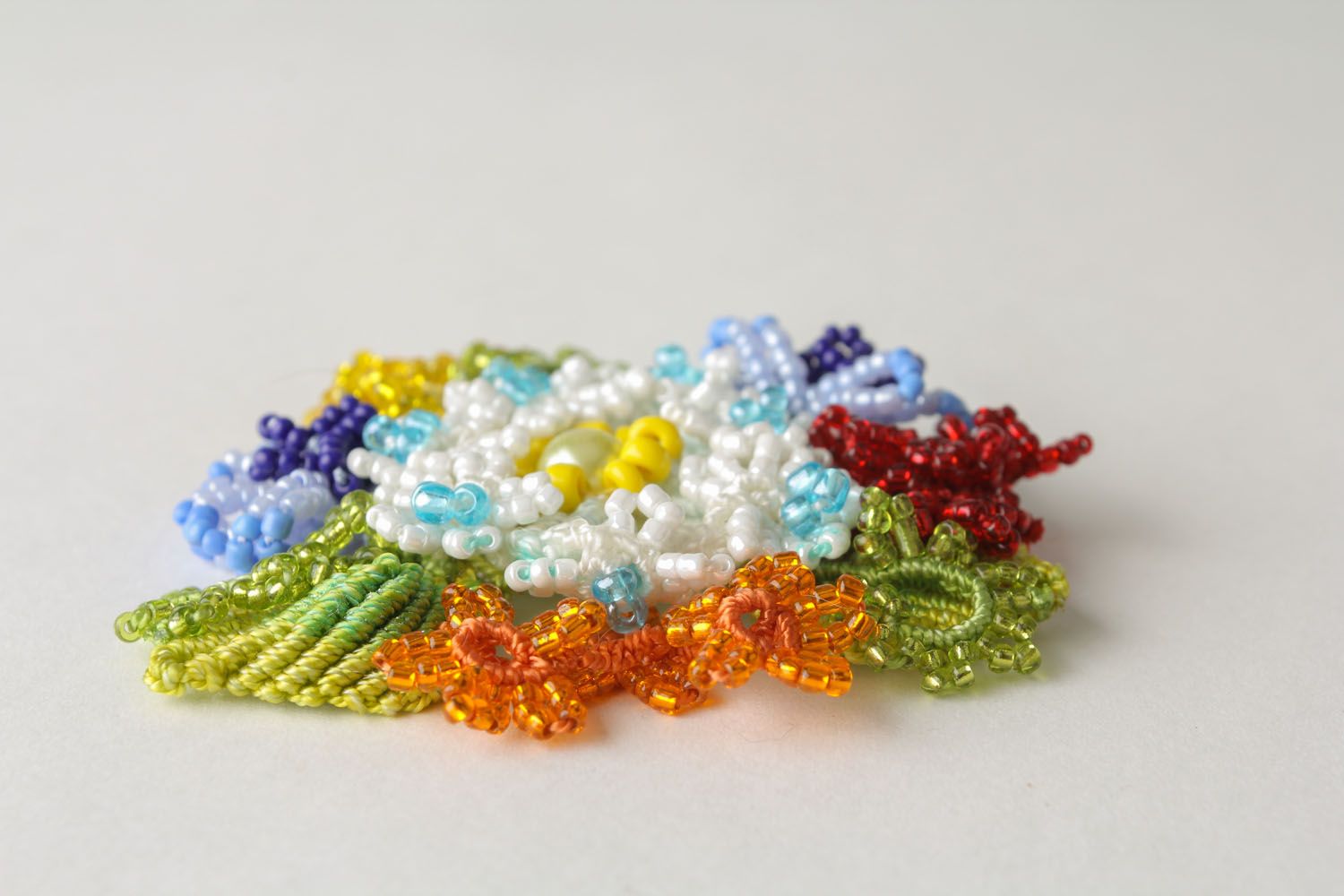 Brooch made of threads and beads  photo 3