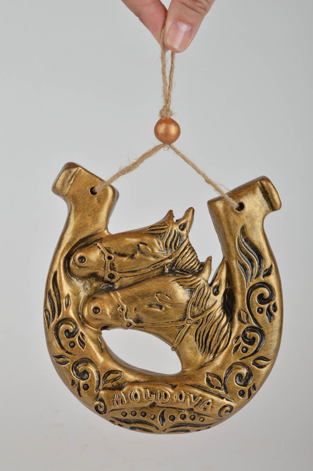Ceramic horseshoe for good luck gold-colored wall pendant handmade souvenir photo 3