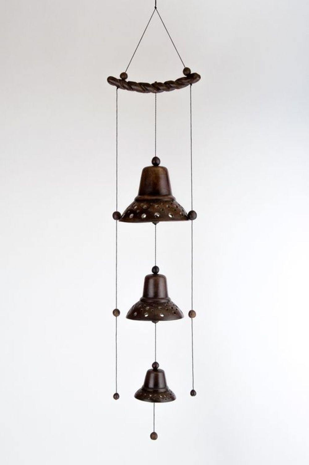 Ceramic bells of different sizes photo 1