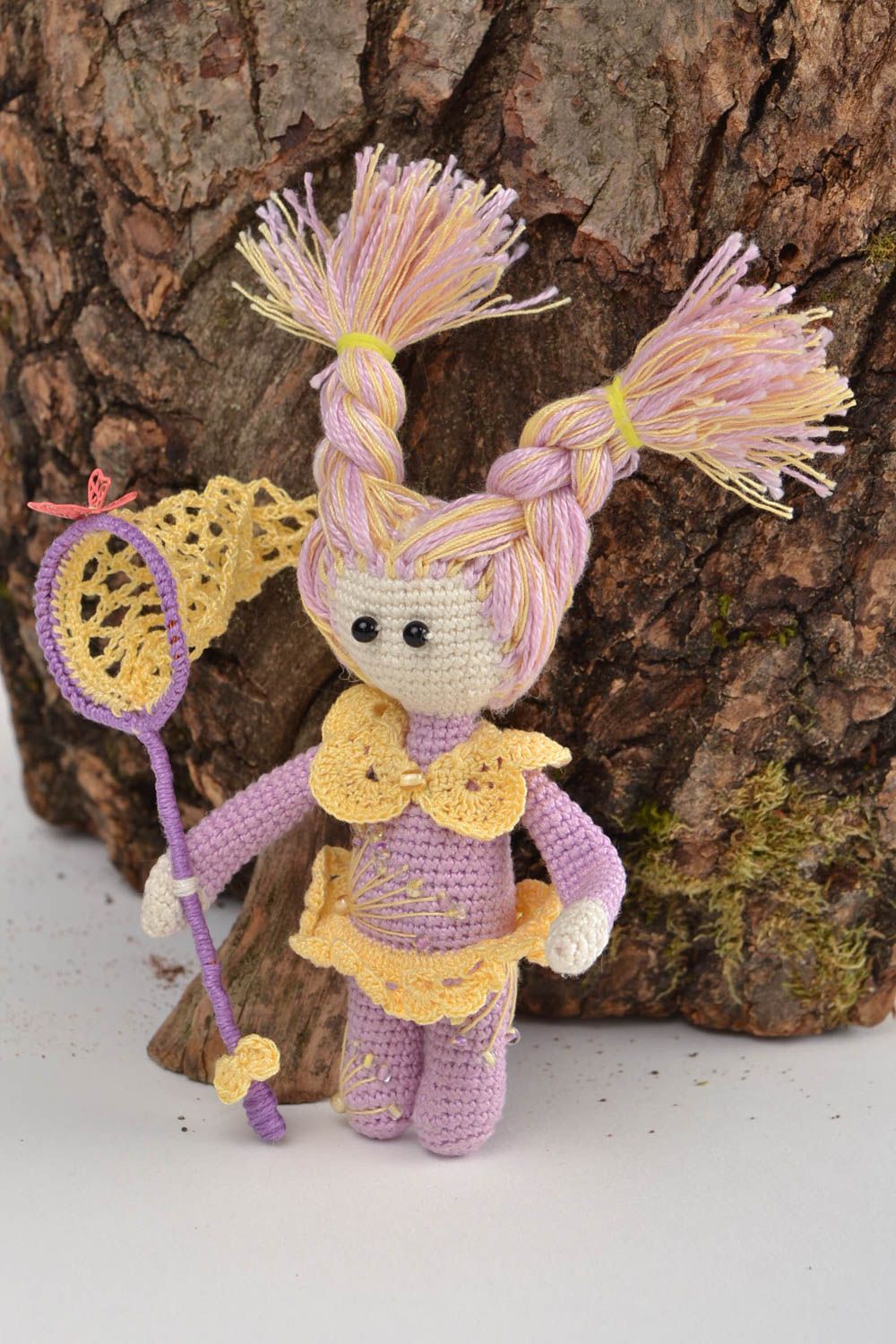 Handmade soft toy crocheted of cotton threads Girl Ellis with butterfly net photo 1