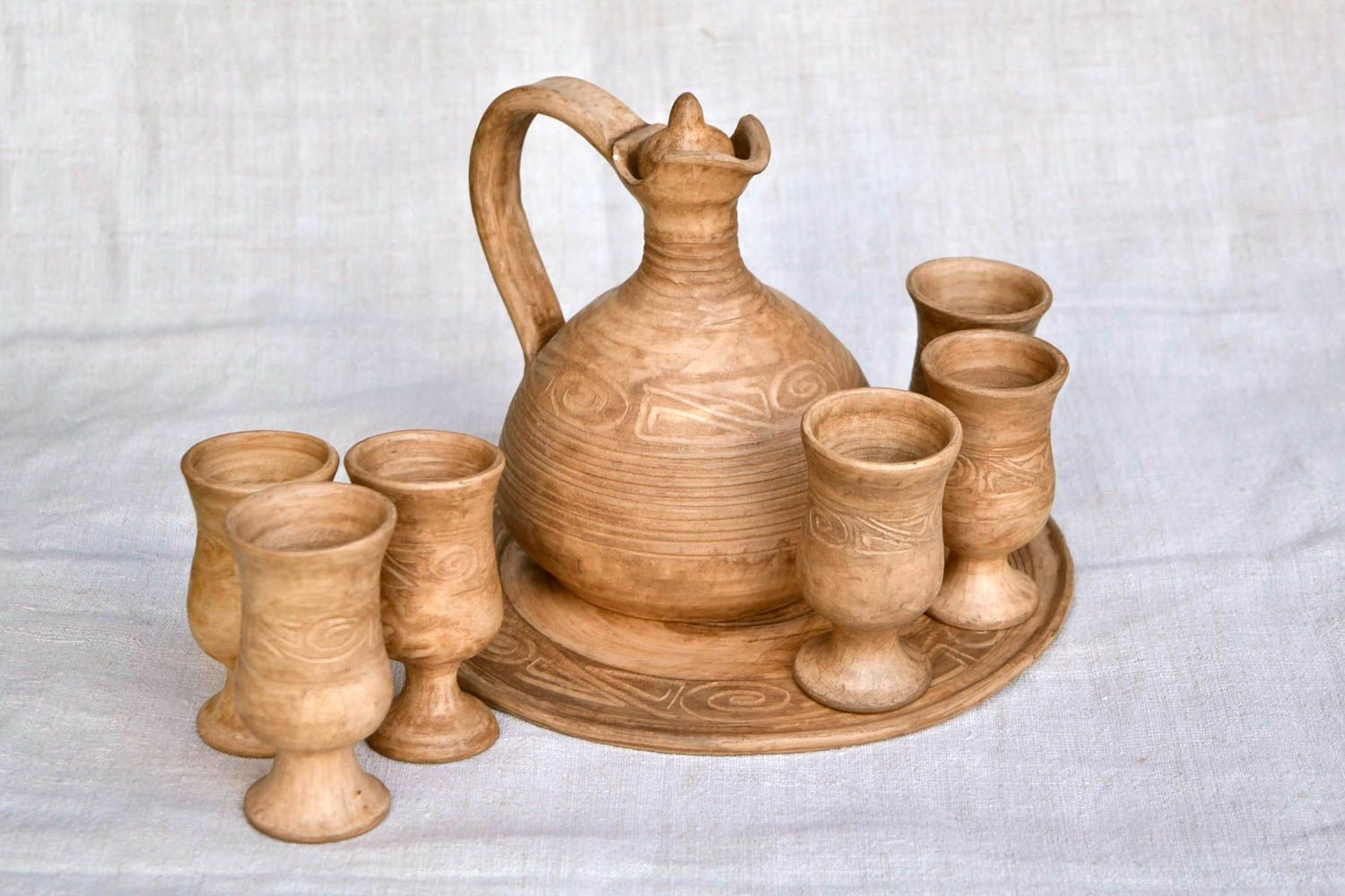 Jarro de cerámica hecho a mano copas de barro bandeja artesanal de arcilla foto 5