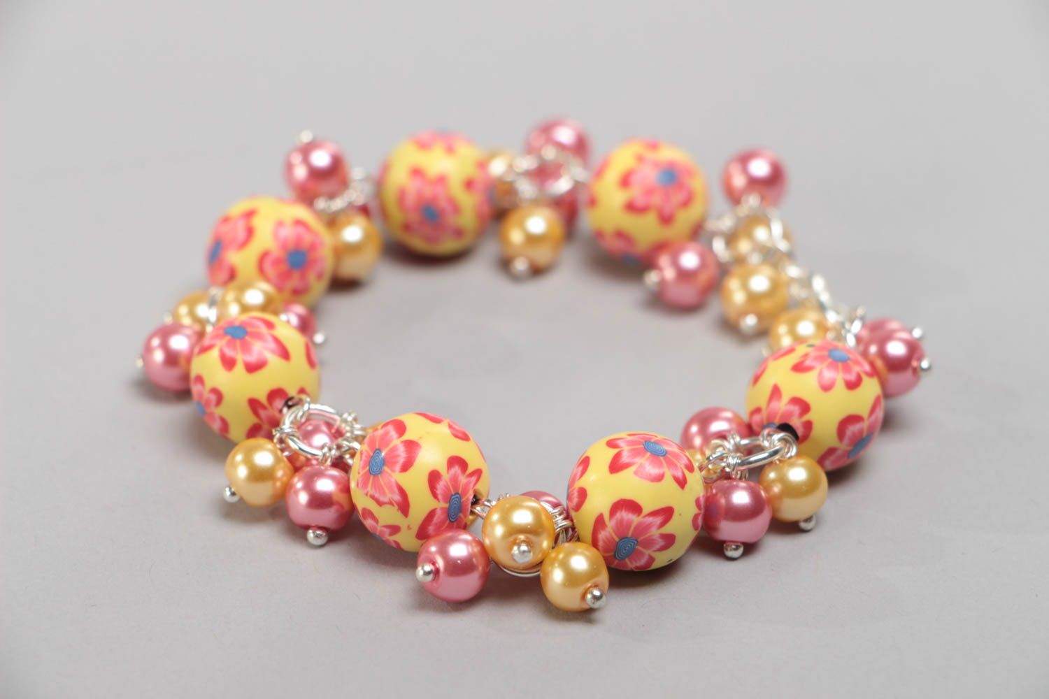 Handmade yellow children's polymer clay bracelet with charms and beads photo 2