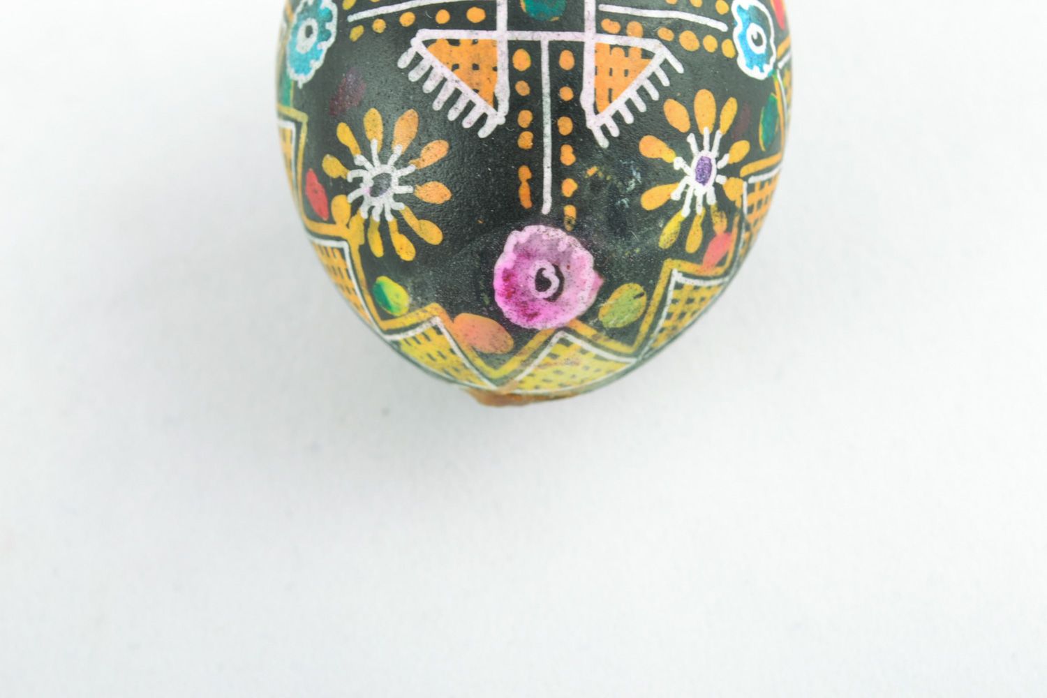 Handmade traditional Easter egg painted using wax technique for interior decor photo 4