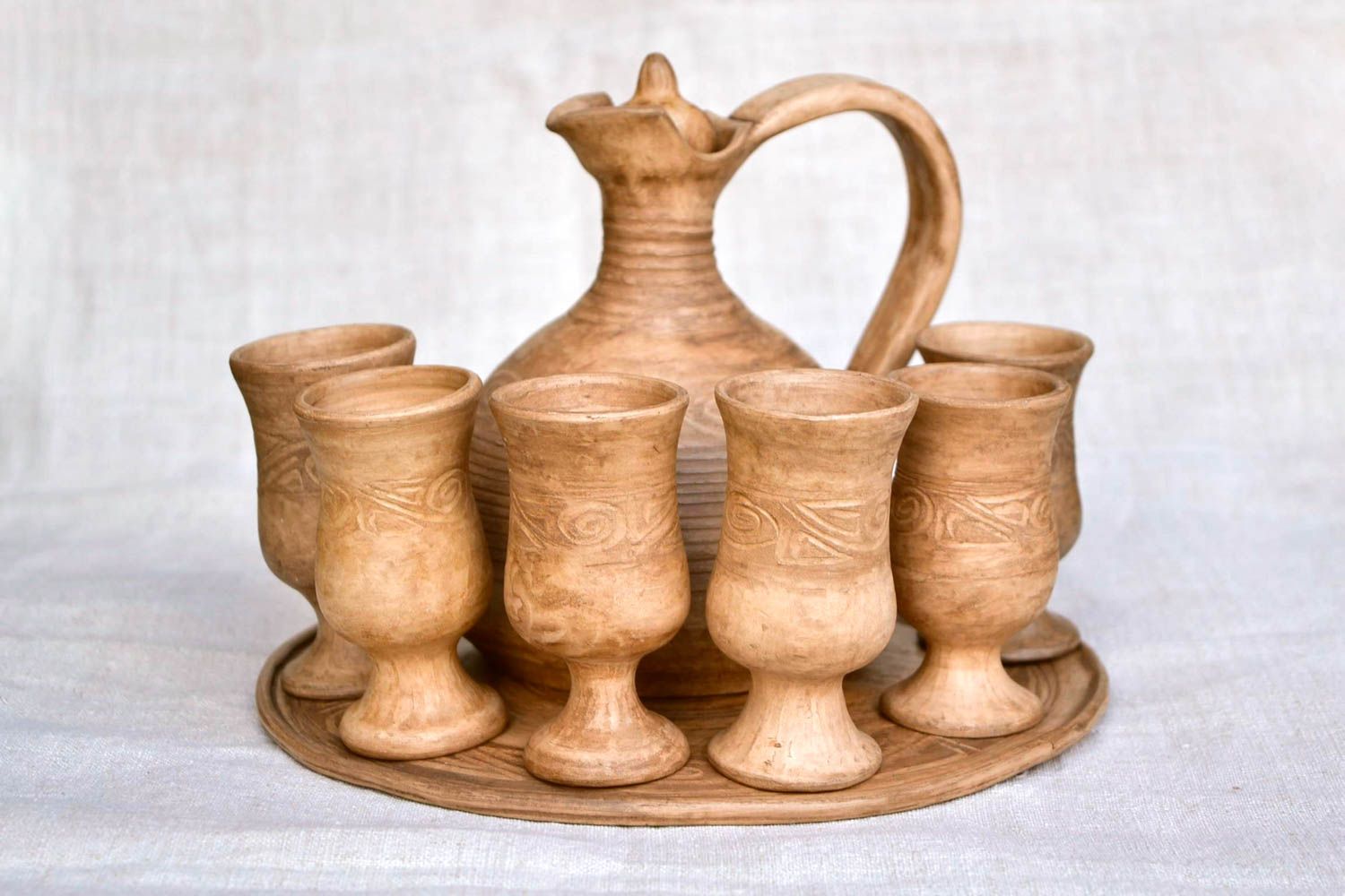 Jarro de cerámica hecho a mano copas de barro bandeja artesanal de arcilla foto 4