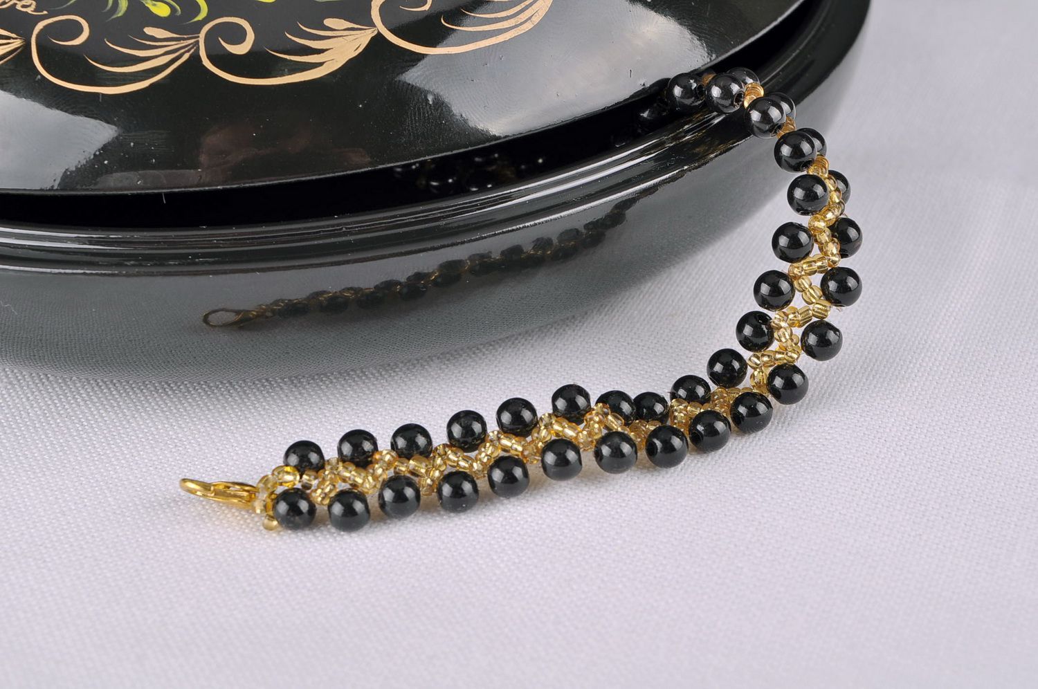 Bracelet fait main en perles de rocailles Moitié de rhombe photo 1