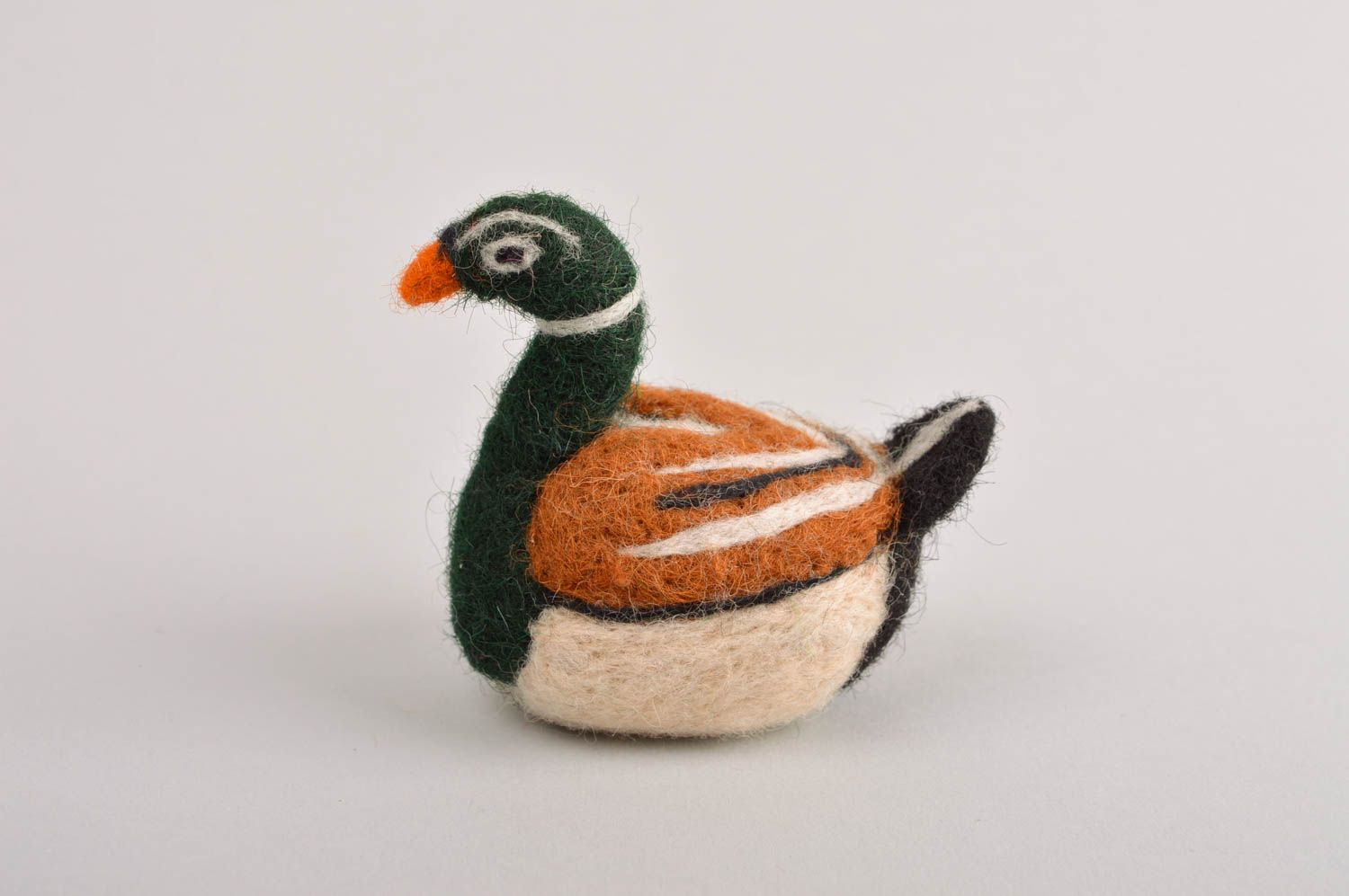 Kleines Kuscheltier Ente handmade Spielzeug aus Wolle Geschenk für Kinder foto 3